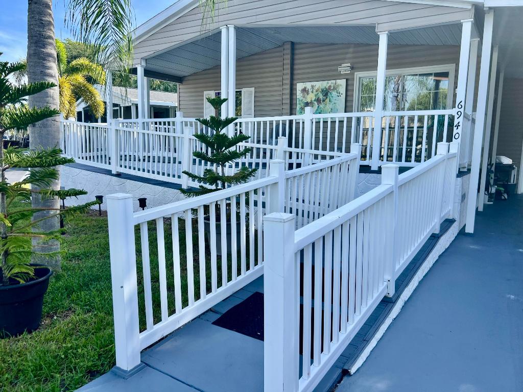 THIS IS A 2/2 MANUFACTURED HOME WITH A FLORIDA ROOM CONVERTED INTO A 3RD. BEDROOM. DEERFIELD LAKE IS A 55+ COMMUNITY CLOSED TO MAJOR ROAD, AIRPORTS, HOSPITALS, RESTAURANTS, SHOPPING AND MUCH MORE. THE COMMUNITY HAS A SMALL FITNESS CENTER, SHUFFLEBOARD, PICKLEBALL, HEATED SWIMMING POOL, LARGE CLUB HOUSE THAT OFFERS LOTS OF ACTIVITIES AND FREE WI-FI. THIS HOME IS TOTALLY REMODELED WITH LOTS UPDATING. THE MONTHLY LOT RENTAL IS $1,150.00 THAT INCLUDES: WATER, TRASH REMOVAL AND LANDSCAPING.