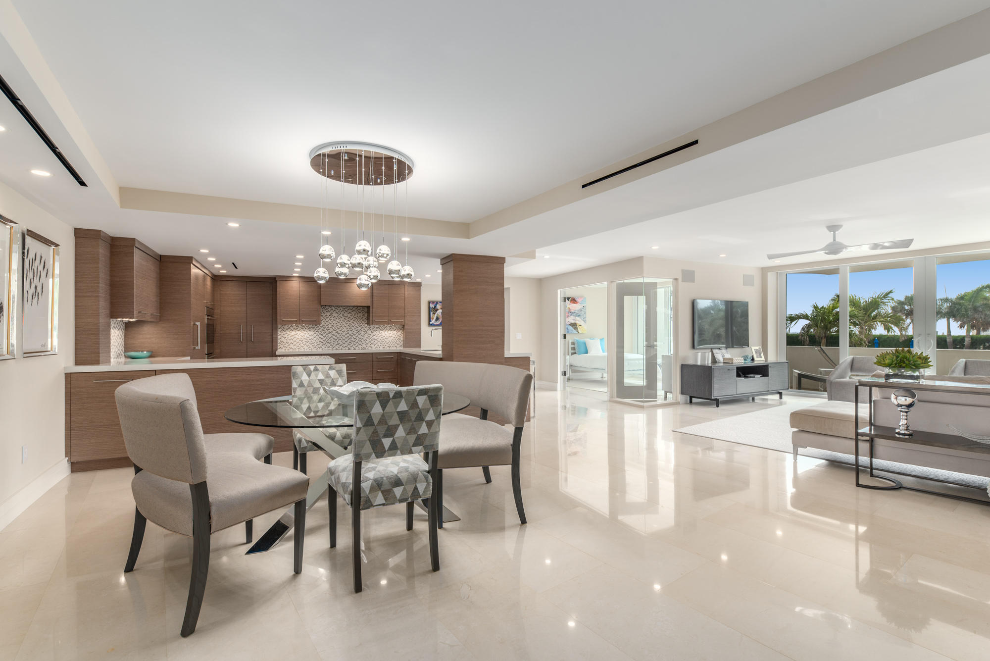 Expertly renovated, 4 bedroom/4 bathroom plus den (3000+ sf) ''smart home'' with ocean views at sought after Sun & Surf. Light & bright with top of the line finishes, state of the art open kitchen, quartz bathrooms, marble/limestone floors, Lutron LED lighting, Hurricane impact doors, laundry room, and much more. Enjoy the best location in this full amenity building this season. Don't miss this special opportunity!