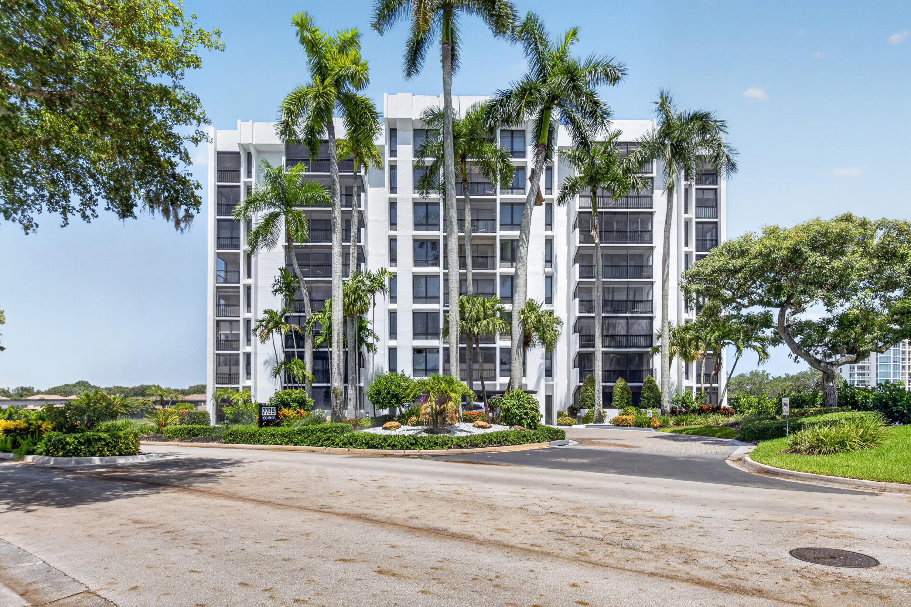 Lakewood 7th floor corner Midrise apartment with great panoramic water and golf course view. Remodeled and upgraded interior. Porcelain tile floors throughout including patio Small patio glassed in and incorporated into the living area. Modern kitchen with granite counter, stainless appliances  and new cabinets. Both bathrooms redone with higher vanities, granite counters, toilets and showers. No pop corn on ceilings. All furnishings available. Comes with one assigned covered and one open parking spaces.  Buy now before club membership increases on October 1st. Note: Golf course is currently under redesign with fall completion scheduled.
