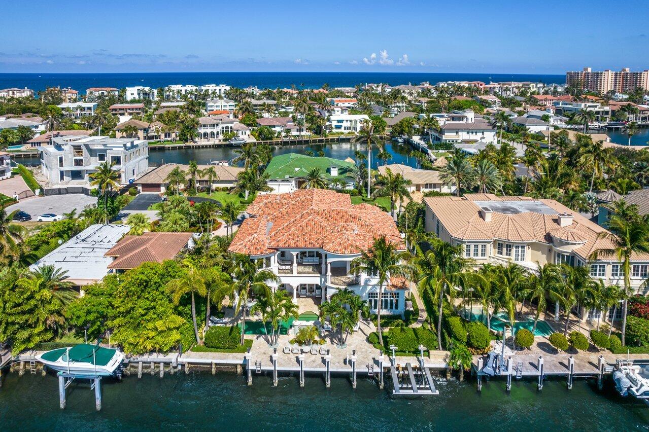 This fabulous luxury Bel Lido waterfront residence, 4216 Intracoastal Drive Highland Beach, has it all... deeded beach access, sweeping panoramic water views and one of a kind setting with 95' of Direct Intracoastal for beach and boating pleasure plus private beach access when the surf calls!!! Uniquely nestled in Bel Lido, a private and quiet enclave close to pristine beaches, this luxury home is built with extraordinary quality and style and boasts over 7,560 square feet of living area with 6BR and 6 plus baths. Intergrading the most progressive design and fine millwork the ground floor features a spacious open living plan; a great room with floor-to-ceiling windows, a formal dining room, an oversize gourmet kitchen, with fully equipped Butler's Pantry and top-shelf appliances is sure to delight the most discerning chef. Enjoy casual gatherings in the cozy family room with unobstructed water views. . In addition, the home offers a private office with Wine Storage and a Tasting Room for the enjoyment of special guests and family. Continuing the elevated amenities is a spiral staircase or elevator to a second-floor sumptuous master suite complete with a spa-like bath and balcony providing the owners a peaceful retreat and brilliant sunsets over the Intracoastal Waterway. Additional features include and Exercise and media rooms, a full house generator, and a three-car garage.  Seamlessly incorporating the interior and exterior space the loggia and resort-style salt-water pool/spa with summer kitchen and water fountain are lushly landscaped for maximum privacy. Located moment to a cornucopia of fine restaurants, boutiques, and lively entertainment along famed Atlantic Avenue and minutes to Boca Raton... the perfect place to call home. 
Sweeping panoramic water views from this fabulous luxury waterfront residence in a one of a kind setting on 95' of Direct Intracoastal, 4216 Intracoastal Drive Highland Beach, has it all.