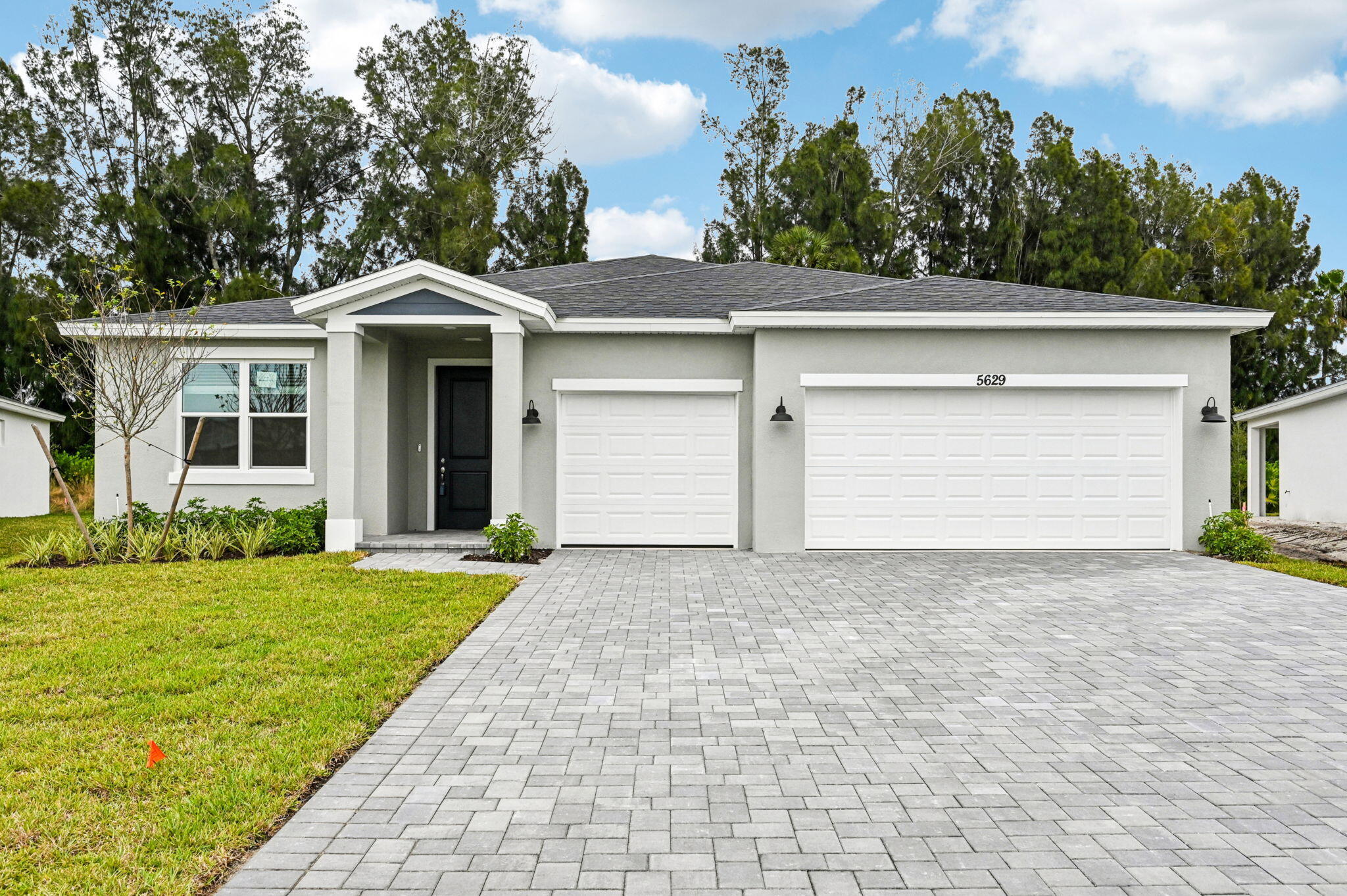 Brand NEW thoughtfully designed home with 60-day closing ready guarantee! 3BR/2.5BA + flex room, 3Car garage & open concept layout ideal for today's lifestyle. Built with all-block construction, impact glass windows & doors, spray foam insulation, smart home tech, & energy-efficient features designed to help lower utility costs, improve indoor air quality & enhance year-round comfort. Residents enjoy security gated access, community pool + pool house, low-maintenance living & prox to conveniences. Buyer may receive up to $15k towards closing costs when financing through preferred lender, MTH.