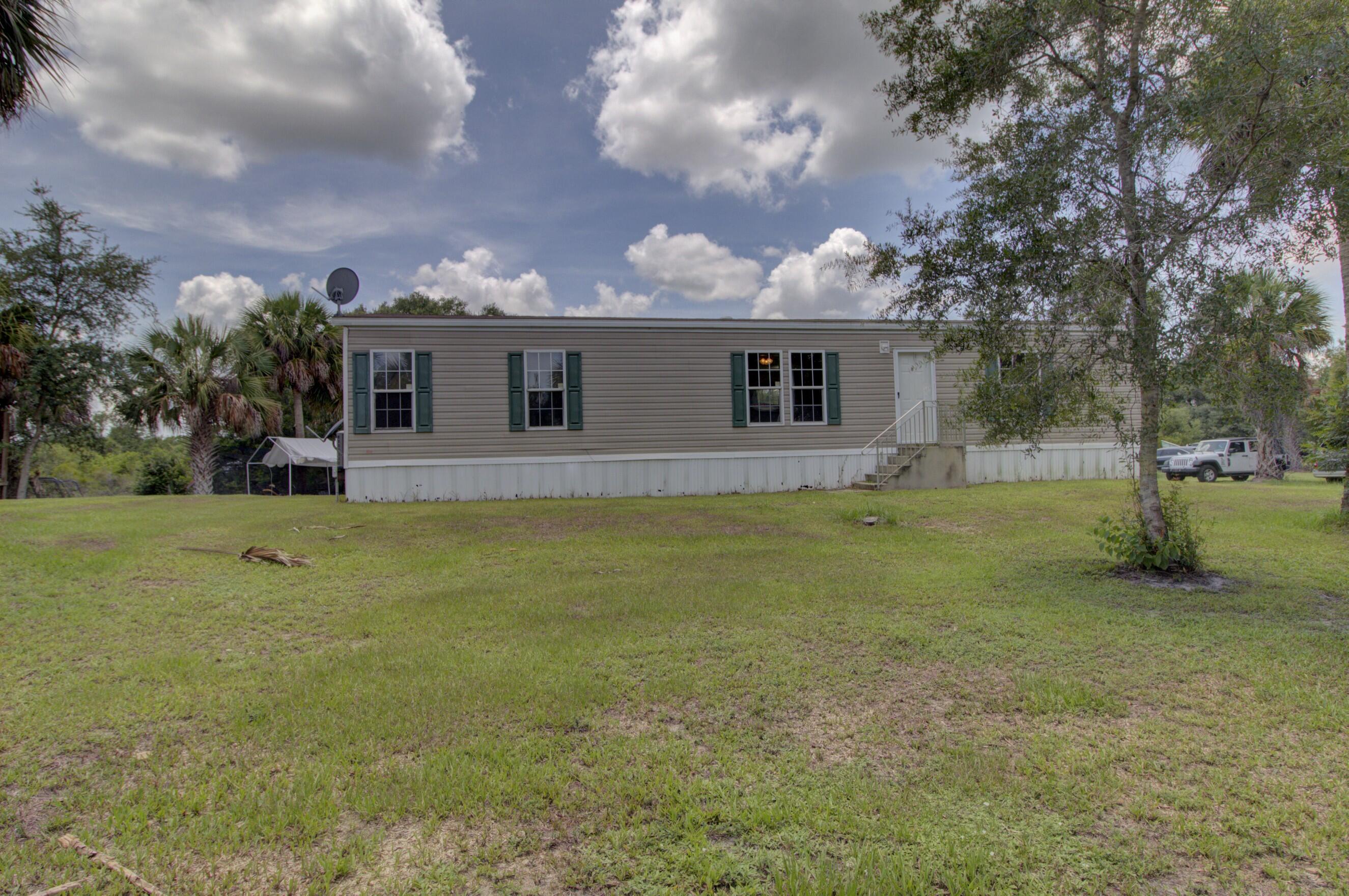 Rural living at it's best.  Located on a large 1.25 acre lot this 3 bedroom 2 bath mobile home was built and installed in 2020. Key features include a large open living room, kitchen island, large shed with roll-up door, modern design, lots of natural light, and large open/dry corner lot.  Affordable and move-in ready.  Call today to schedule a showing.