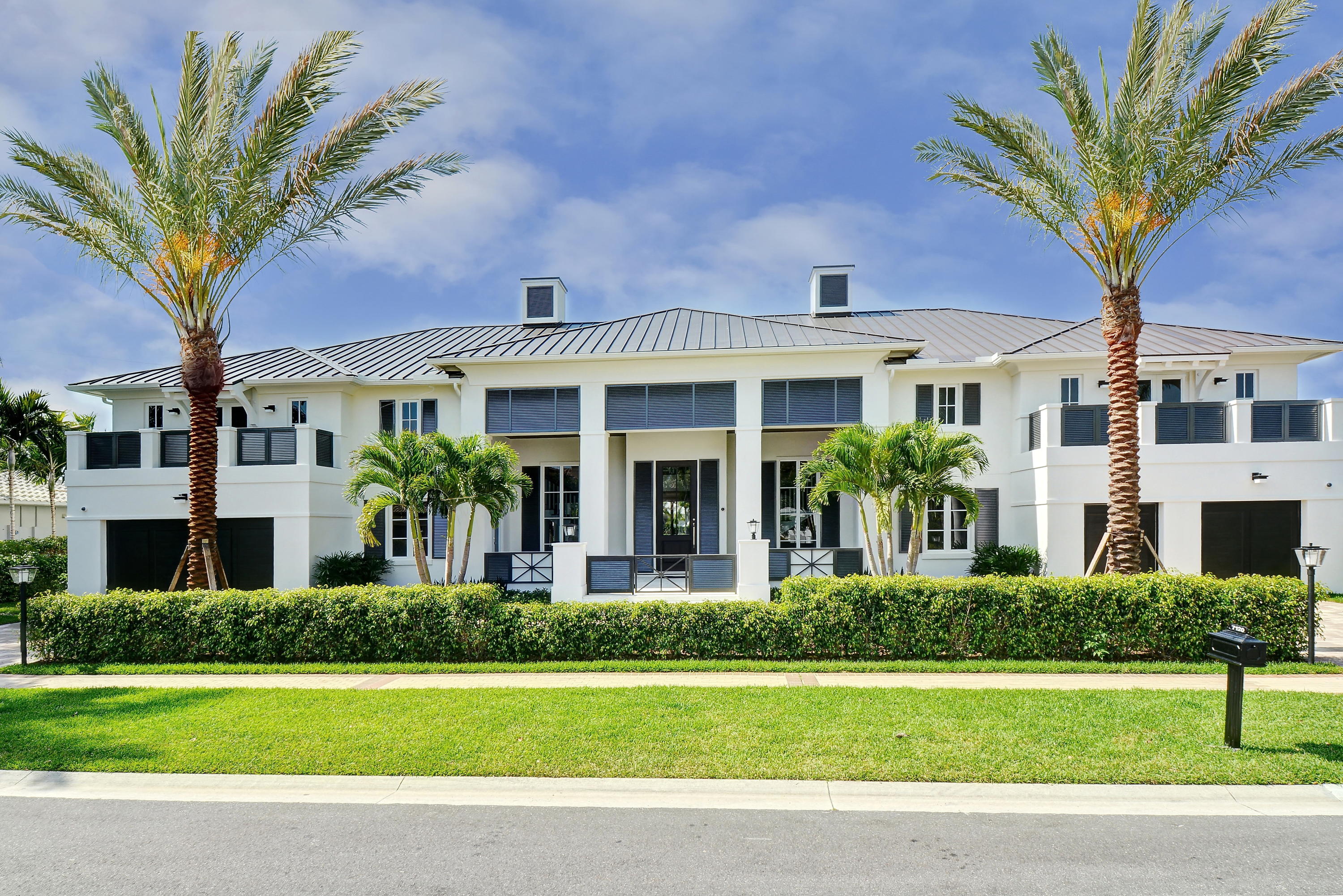 Magnificent custom estate home constructed in 2014. With 7 bedrooms, den/office, custom theater, and exercise room, this home has all the high-end bells and whistles you desire, including an elevator, full-house generator, wine cellar, dual laundry rooms, Control4 smart home system, and additional bespoke features throughout. Ground-level master suite with his & her baths & custom walk-in closets. Gourmet Gaggeneau kitchen opens to the family room and has fully-retractable sliding glass walls, leading out to the patio area with summer kitchen, built-in BBQ, and electric phantom screens, perfect for indoor-outdoor living and entertaining. Southern exposure in the backyard, with expansive lake and golf views. No expense was spared in creating this one-of-a-kind custom home.