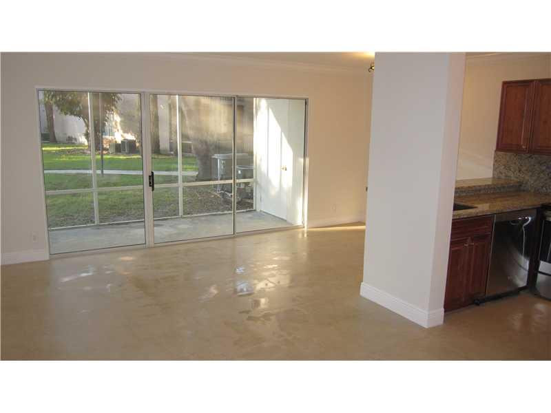 Beautifully updated, spacious (862 square feet), 1st floor condo, located in the gated community of Parc Vista, in the beautiful Hammocks. This condo offers tile flooring throughout, updated kitchen, stainless-steel appliances, updated bathroom, along with washer and dryer inside the unit. Relax and enjoy the outside in the screened-in porch where you'll also find a storage closet for extra space. There is 1 assigned parking space and plenty of guest parking nearby. The community offers a variety of amenities including a pool, well-equipped gym, club house, and tennis courts. This community is situated in a prime location close to multiple restaurants, shops, Baptist hospital, and top-tier schools.