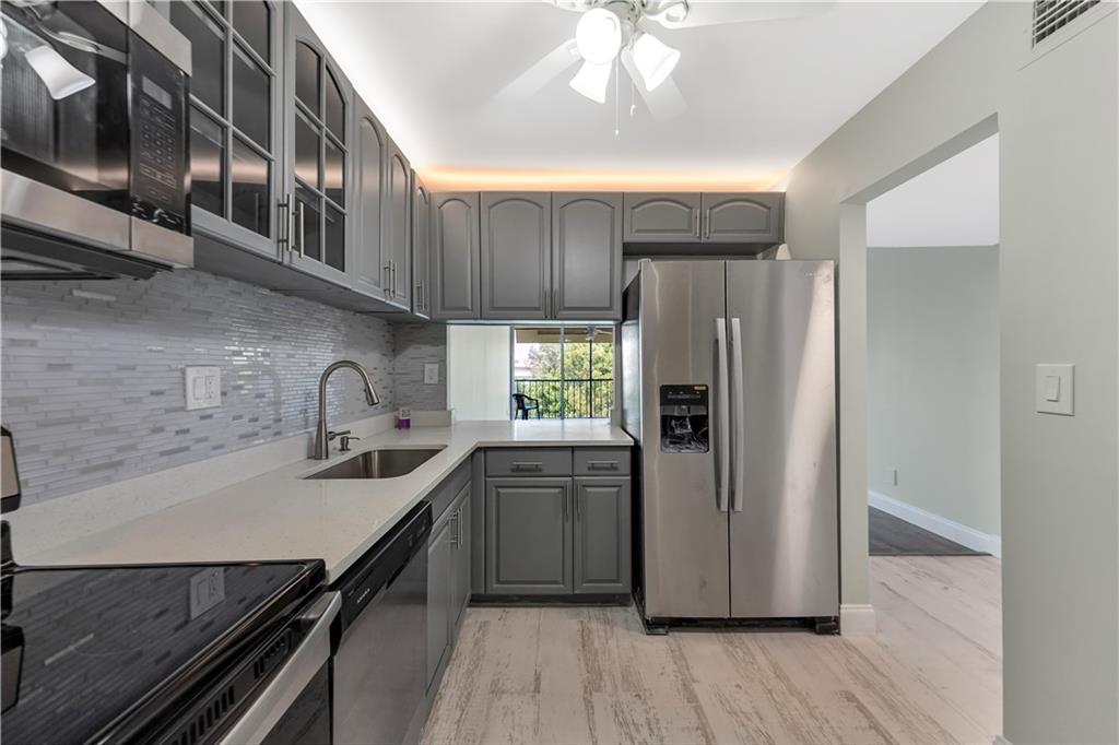 BEAUTIFUL RENOVATED HOME IN A PRIME LOCATION! WALKING DISTANCE TO THE POOL AREA AND CLUBHOUSE. TRADITIONAL LOAN ISN'T AN OPTION FOR THIS BUILDING (SPECIAL LOAN REQUIRED)!! THIS HOME IS SECURED WITH A GUARD ON SITE 24/7. SHORT DRIVE TO ALL MAJOR STORES SUCH AS PUBLIX, WAL-MART AND MORE. YOU WILL NOT BE DISAPPOINTED IN THIS GEM AND IT'S A MUST SEE!!! HOPA ver +55, 20% down, 55k income, 6 months in escrow.