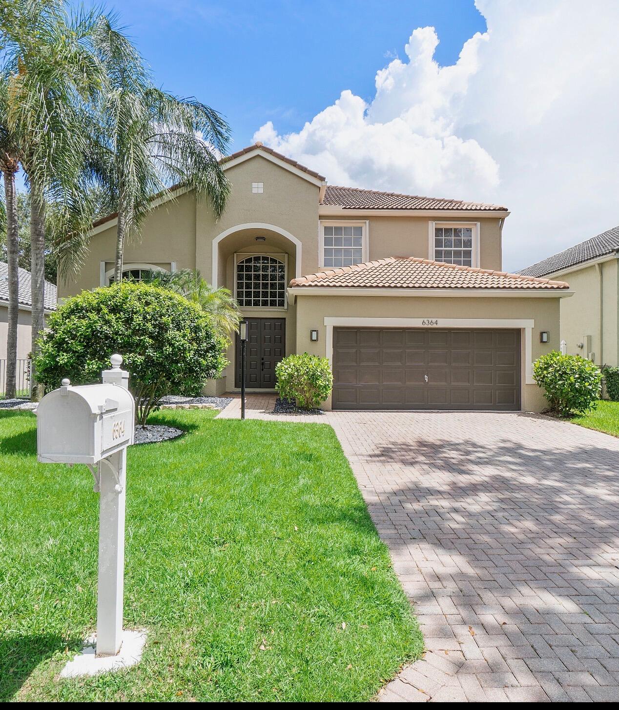 Beautifully updated and spacious 5BR/3.5BA home in the guard-gated community of Mayfair in desirable Parkland. Bright open layout with abundant natural light, large living areas, loft space, and primary suite with modern bathroom featuring frameless glass shower and freestanding tub. Enjoy a private backyard with very large paver patio with screen enclosure with roof overhang - perfect for relaxing in your backyard and entertaining!  Located across from Terramar Park with playgrounds, tennis, pickleball & basketball courts. Zoned for top-rated Broward County schools and walking distance to houses of worship. Prime location near Boca Raton, major highways, shopping & dining.