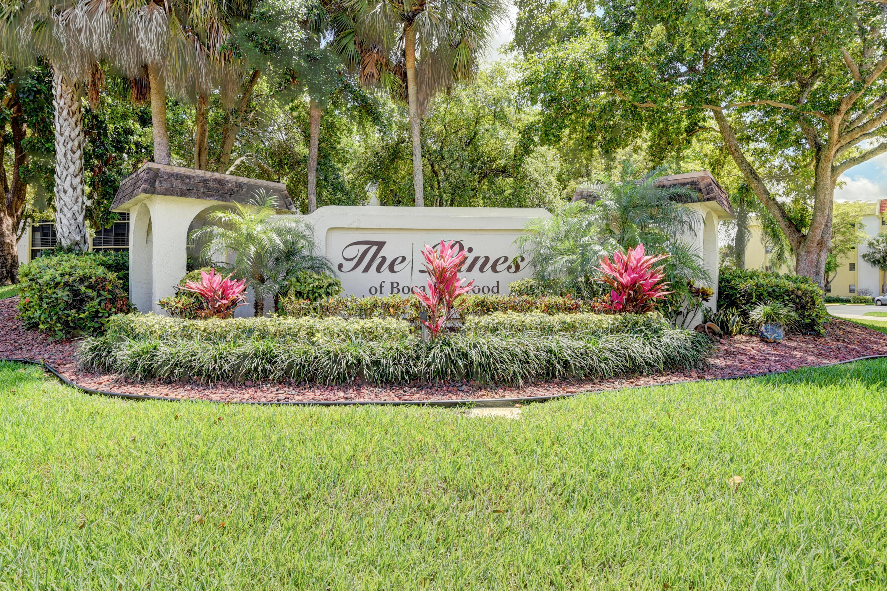 Available immediately furnished or unfurnished!  Annual rental only. Experience the pinnacle of 55+ resort style living in the heart of Boca Raton!  This exceptional residence offers a spacious living/dining area with a fully renovated gourmet kitchen, granite counters and wooden cabinets.  The unit also features two bedroom, two full bathrooms with a laundry room equipped with a full size washer and dryer.  Enjoy the views of the pool and garden beyond complemented by the covered patio.  Perfect for entertaining guests!  Country club style amenities include pool, tennis, fitness center, game/meeting room, library, billiards room, shuffleboard and a theatre.  Ideally located near top dining, shopping, the highways and pristine beaches.  This home embodies the ultimate Florida lifestyle!