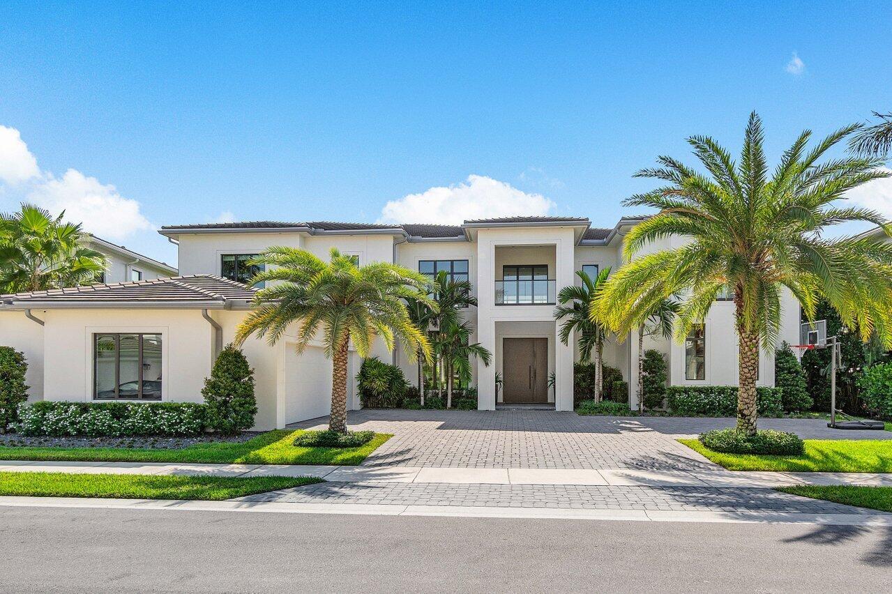 Presenting the epitome of luxury within Royal Palm Polo. The reimagined & expanded Furnished Villa Lago by Toll Brothers embodies elegance & sophistication, featuring a sleek glass staircase & soaring ceilings that enhance the 2-story grand foyer. This Estate showcases professional interior design by Farache Bromberg with luxurious wall coverings, custom-built cabinetry, & exceptional lighting. Unparalleled with exquisite Minotti & Artefacto furnishings alongside other premier designers. The Primary suite is conveniently located on the first floor, with breathtaking walk-in closets. The main level of the home features an office, guestroom, & an expansive family room with wet bar. The separate living room with Holly Hunt lights & formal dining room seamlessly flow into the chef's kitchen, featuring high-end Wolf & Sub Zero appliances and a large island. The second floor accommodates three guest suites plus a second VIP Primary suite, a well-appointed media room, and a loft with a second living room. The pristine and private backyard offers lush landscaping, an expansive pool, a summer, outdoor dining and lounge area with cabana bathroom. This gorgeous home has everything you desire including automation by Control 4, water filtration systems, central vacuum, and a generator.