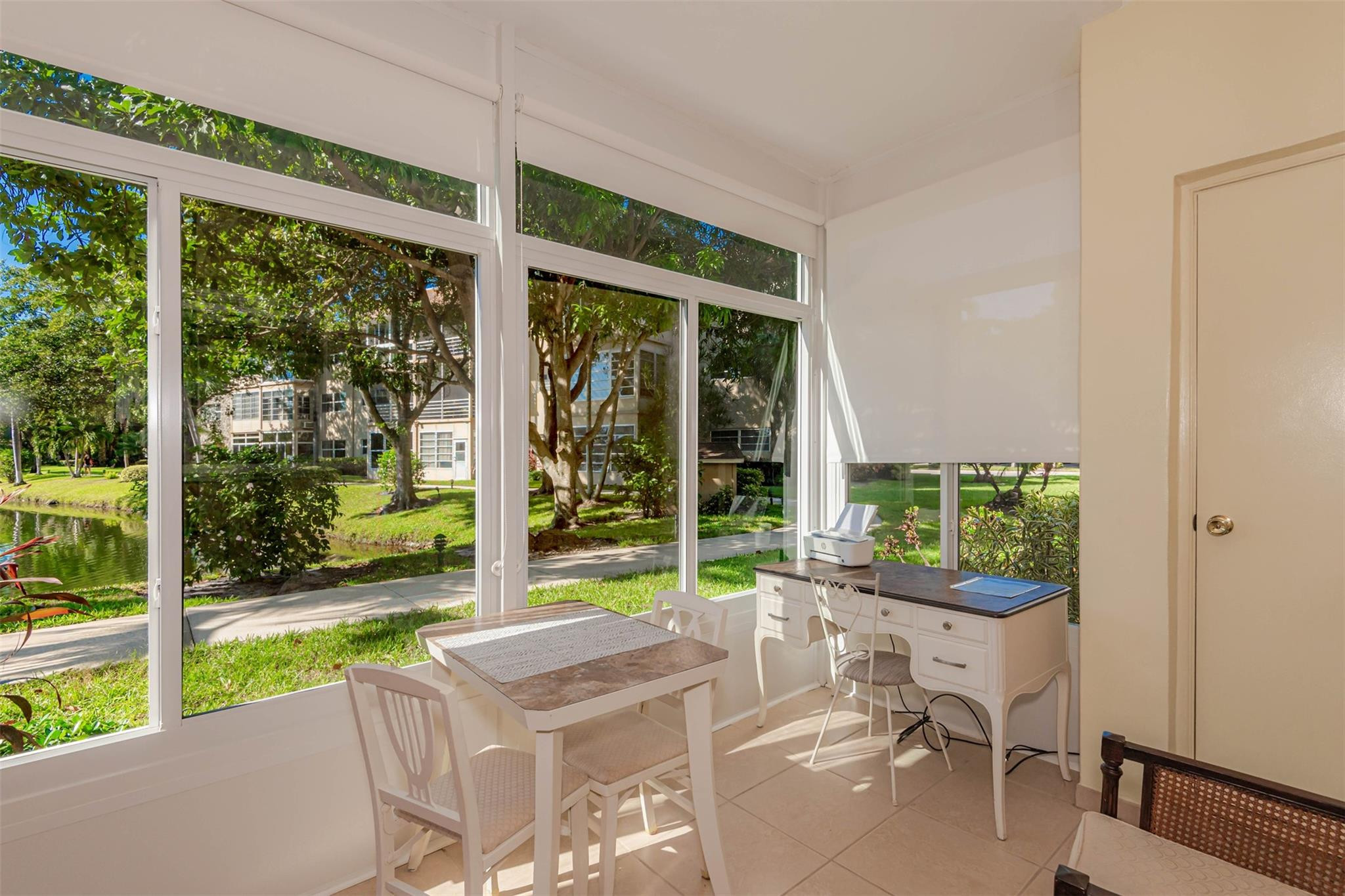 Beautiful condo in Hawaiian Gardens phase 3 in Sunflower building. Totally renovated, new kitchen and bathroom, tiles through out, impact windows every where and door. AC 2024 new electric panel, Murphy bed in the Florida room. Peaceful view of the lake, fountain and gardens. Building in good condition, pass the 50 years inspection. Very active community: Petanque, shuffleboard, heated pool, exercise and billiard room and more. Good location close to: Restaurants, stores, highway, airport, beach. Don't wait make an appointment.