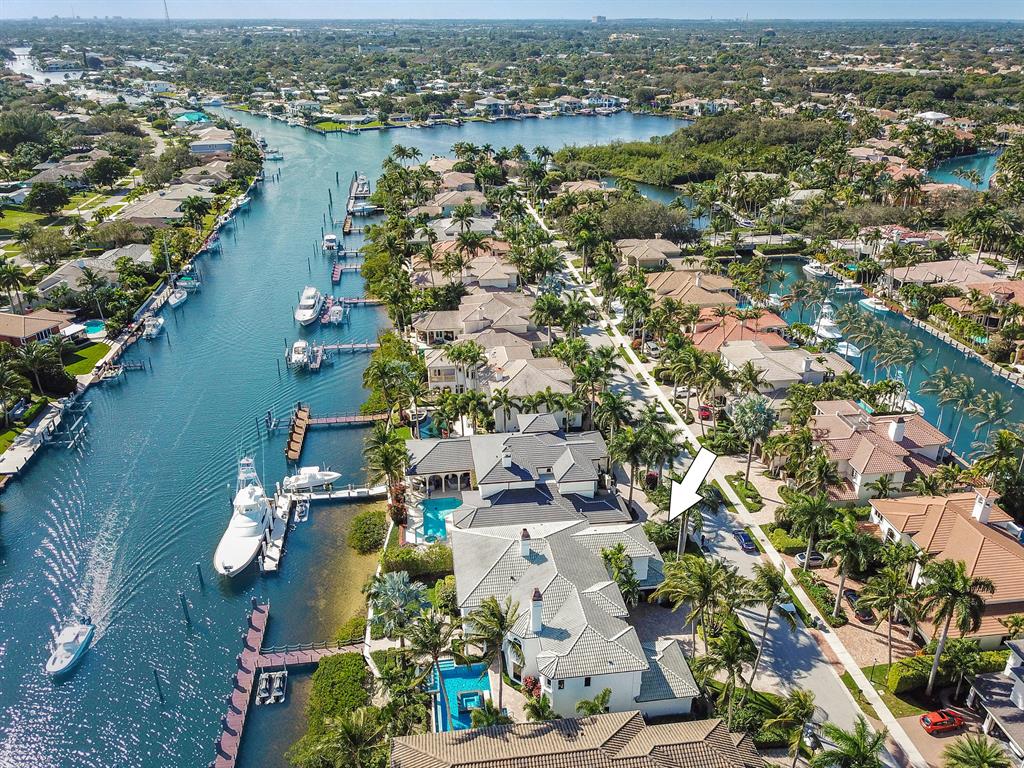 Charming estate home located on 100ft of water frontage in the highly desirable gated community of Harbour Isles. This is a unique lot that can accommodate up to an 80ft vessel. As you walk into the inviting entryway of the home you are greeted with serene views of the water feature of the resort style pool/spa, the tranquil flow of the waterway, and just beyond that, are views of the lush greens of the North Palm Beach Jack Nicklaus ''Signature'' Golf Course. This home boasts 5 bedrooms, 6.2 bathrooms, 3 car garage, private pool/spa.