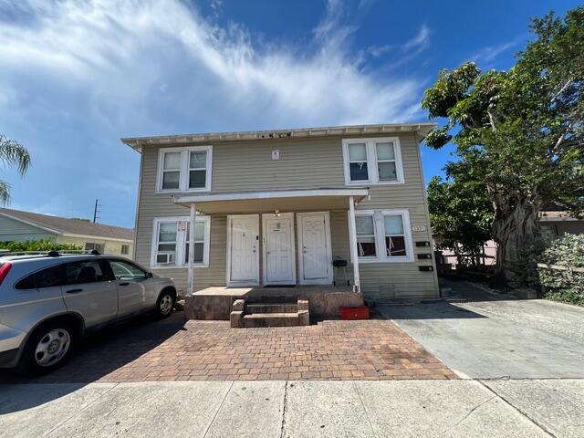 This is actually a 5 unit apartment building in Mercer Park. Walking distance to down town West Palm Beach. Two- 2 bedroom units, 2- one bedroom units and a studio. Gross Rents of $88,440/year! Off street parking for 7 cars. Unit 5 is a studio and rents for $1075/mth. Priced at an almost 7% cap rate. This one will not last!