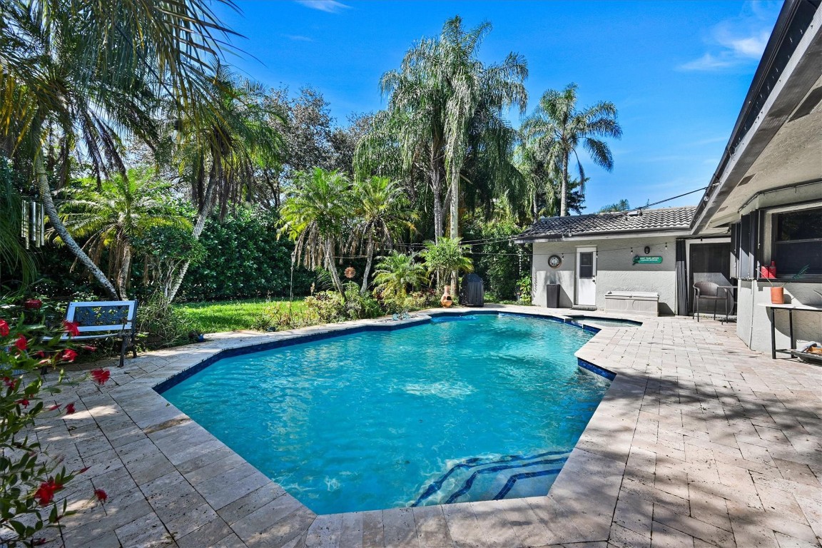 Beautiful 4 bedroom 2 bathroom pool home in Cypress Glen. Great split floor plan with updated kitchen. The eat-in kitchen features quartz countertops and newer appliances. The large formal dining area flows seamlessly into the formal living room. The big primary bedroom has a walk-in closet with built-ins. The primary bathroom is updated with granite dual vanities, step-in shower and separate tub. The expansive backyard and pool area with jacuzzi is perfect for entertaining. The accordion shutters offer hurricane protection and an insurance discount. Great location, close to the highway, restaurants, shopping and schools.