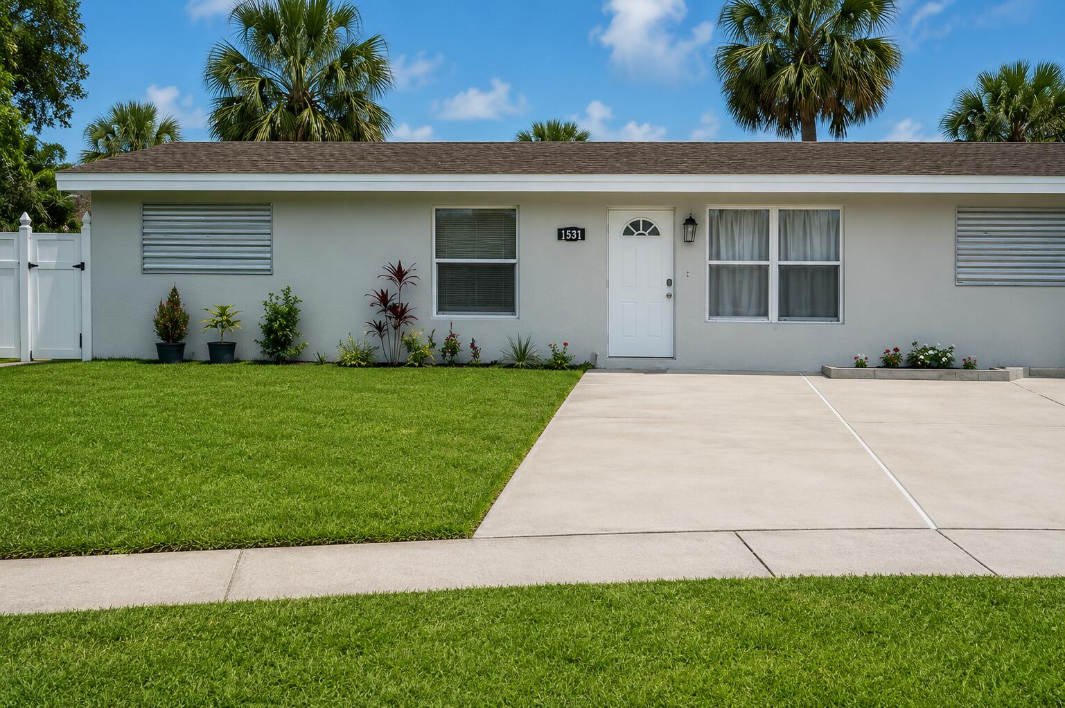 Beautifully remodeled 4-bedroom, 3-bathroom home with a fully updated kitchen featuring stainless nice appliances and an open design. ONE OF The masters suite is a mother-in-law suite for added versatility. The home boasts ceramic tile and laminate flooring through. It also includes a brand-new washer and dryer, a spacious fenced yard, and a separate air conditioning unit. Windows are fitted with storm shutters or impact-resistant glass. this property is Located just three blocks from the Barracuda Bay Aquatic Complex, a fun-filled water park in Riviera Beach offering pools, splash zones, and slides, "The photo use by shop ".