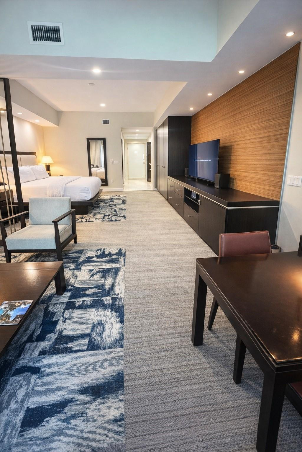 FIRST FLOOR PRIVATE ENTRANCE Fully Furnished Studio with Private Balcony  in the heart of Downtown Doral, unit is part of the hotel-resort program, offering an excellent opportunity to generate immediate rental income. Owners & guests enjoy full resort style amenities, including a spa with massage and beauty services, a fully equipped 24-hour fitness center, an on-site restaurant, and a spectacular resort-style pool. Condo Association fees cover all amenities and utilities such as electricity, hot water, cable, Wi-Fi, 24-hour security, insurance, making it a hassle-free investment, Waling Distance to Downtown Doral, Trump National Doral Hotel & Golf Course, City Place Doral, Miami International Airport, Brickell, Downtown Miami & the beaches.  Owner can stay for up to 6 months per year it can be rented daily independently or through Hotel program. Owner can stay for up to six months per year. Only Owners can have a pets, travelers are not allowed to bring pets.