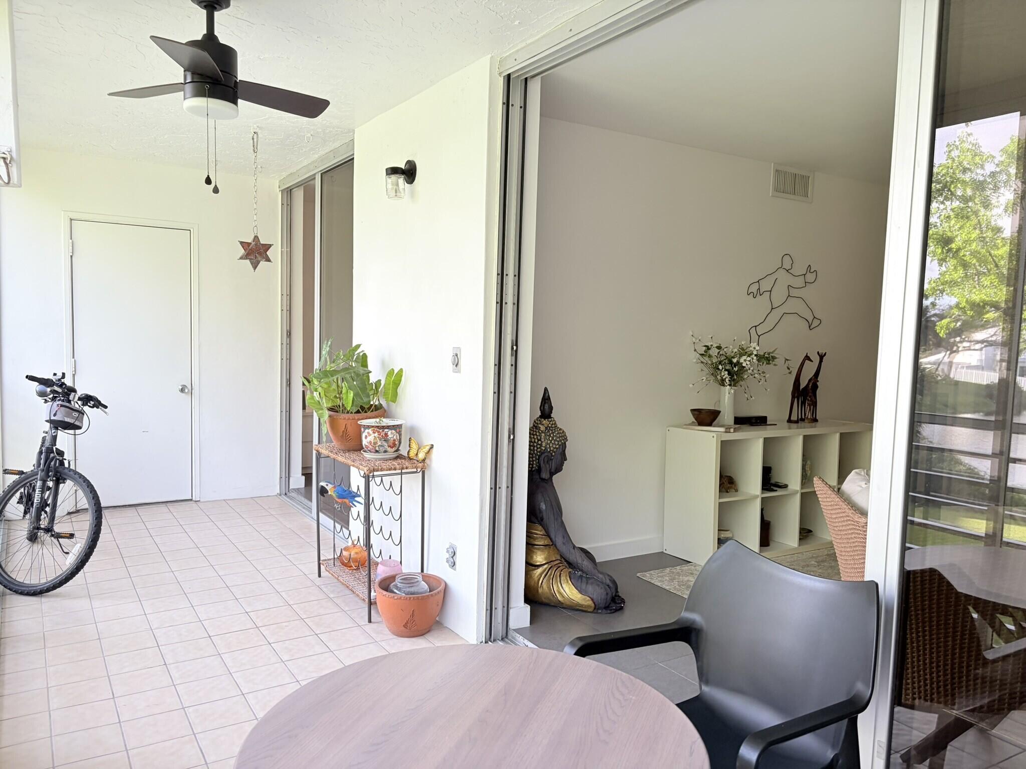 Unfurnished beautiful and bright modern 1-bedroom, 2-bath unit on the 2nd floor with secured lobby access & elevator. Open kitchen, washer & dryer inside, tile flooring throughout, spacious layout & a versatile glass-enclosed & screened balcony with peaceful lake and garden views(perfect to enjoy the breeze or keep enclosed with A/C) Next to one of the community pools, less than 2 miles for shopping & entertainment and approx. 6 miles to the beach. Rent includes water, cable, internet & pest control. Register up to 2 vehicles plus plenty of guest parking. Easy to show, all ages welcome. Pet-free building(ESA welcome) Per HOA 700+ CRscore for primary leaseholder. Approval may take 3-4 weeks