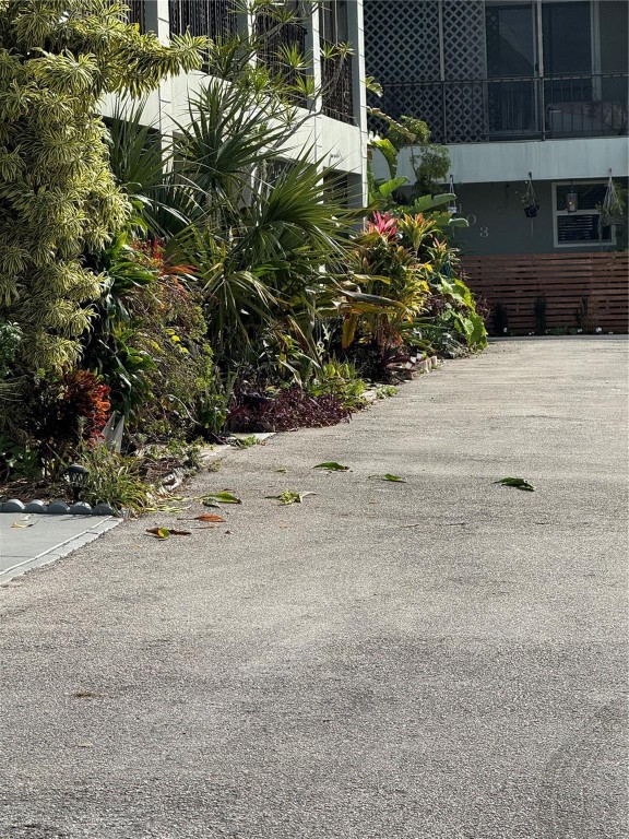 Beautiful townhouse conveniently located in a charming community nestled in the heart of Hollywood. 8 Min to thebeach, 5 min to I95, 15 min to Fort Lauderdale.  Airport, Close to shopping malls restaurants schools. Perfect forfirst time buyers or investors. Can be rented right away. Unit is currently rented month to month. Spacious 2bedroom unit, open kitchen, wood cabinets granite counter tops , microwave Central ac screened enclose patio.Den/ Office washer & dryer inside unit. Assigned parking along with guest spots. Safe & quiet neighborhood in aprime location and well - maintained. Pets allowed no rental restrictions all ages welcome. Low monthly maintenancefee. Fast HOA approval Need 24 notice for showing. Don't miss this great amazing opportunity.