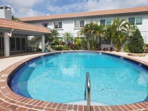 Welcome to this lovely Florida Condo located in a quiet, well-maintained community. This desirable corner unit offers added privacy and beautiful Pool views from its 2nd fl. location. Owned and lovingly maintained by the same owners for many yrs, this residence presents a wonderful opportunity to update and customize to your personal taste. Theunit is in original condition but well cared for. Convenience is key, with assigned pkng located directly at the bottom of the stairs and the condo being the 1st unit at the top for easy access. Whether your seeking a yr-round or seasonal residence or investment opportunity. This property offers convenience and excellent potential in a desirable Florida setting. Enjoy the welcoming community and prime location. Close to shopping, dining, beach.
