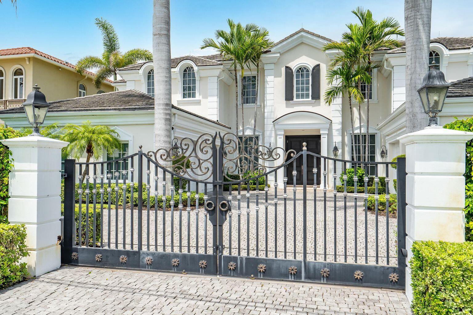 Rarely available Luxurious private gated WATERFRONT estate in Boca Raton's most prestigious enclave. Enjoy the South Florida lifestyle at its best with over 90+/-' of INTRACOSTAL Waterway. This is exclusive a one-of-a-kind custom home with 5-bedrooms/6 full and 3 half-bathrooms, gorgeous gourmet kitchen, ELEVATOR, INFINITY swimming pool and dock that will accommodate two vessels.