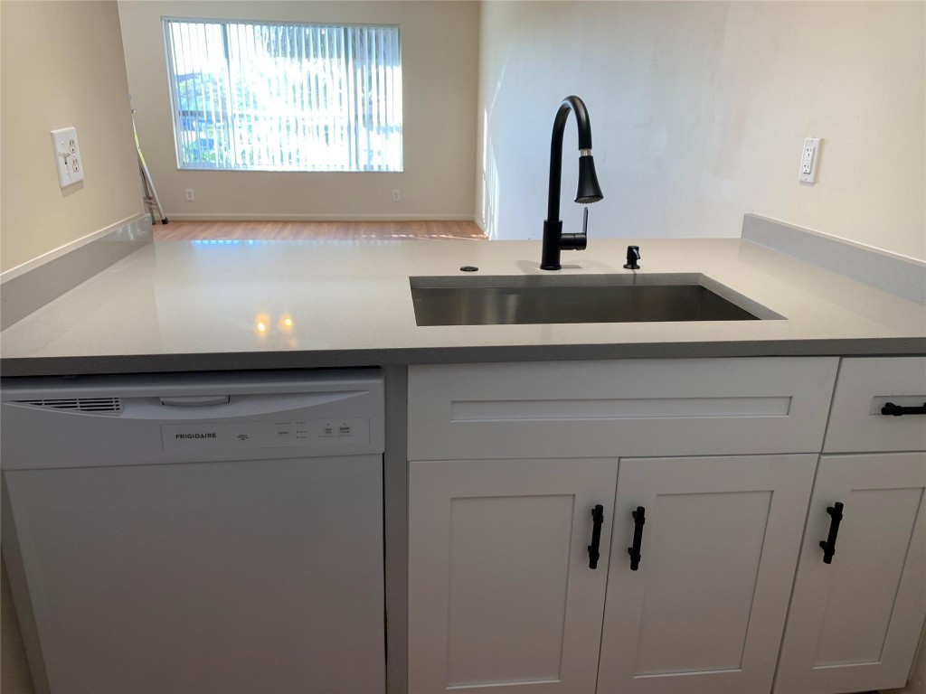 Pristine 2nd Floor, 2 Bedrooms, 2 Bath Condo in the Sought After Community of Lakewood Village. New Kitchen and Wood Laminate Flooring in Living Areas - No Carpet in Unit. Newer A/C, Tankless Water Heater, Freshly Painted, Both Baths Have Updated Vanities, New Toilets and Neutral Tile Showers, Washer and Dryer in the Unit. Resort Style Pool Area has Enormous Pool, Children's Pool and a Hot Tub. Central Coral Springs Location is Close to Fabulous Shopping, Restaurants, Public Transportation and Major Highways. Investor Friendly Can Be Rented Right Away No rental restrictions. Low HOA fee and Pet Friendly under 25 lbs. Minimum Credit Score of 650, as Per Association.  Great for Investors. Property is Leased. West of University Drive on the North Side of Atlantic Boulevard. Head north on NW 100th Terrace. Right at the stop sign and continue approximately half way around. Building 6 on left, close to Pool. Broker Confidential.