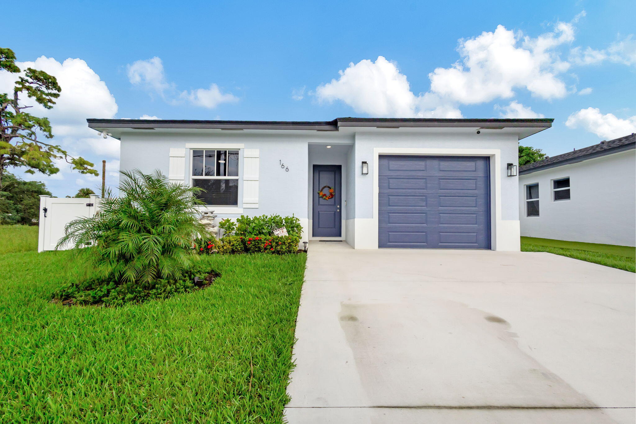 Stunning New Construction 2023 in Prime Location! Discover the charm of this beautifully designed 3-bedroom, 2-bathroom home featuring modern finishes and thoughtful details throughout. Step inside to find an open floor plan with high 9¼-foot ceilings, sleek 8-foot doors, and elegant tile flooring. The kitchen boasts 42'' cabinets, a quartz-topped center island, and plenty of space for culinary creations. Enjoy the convenience of an interior laundry room, a spacious 1-car garage with extended driveway, and a private, fenced backyard perfect for relaxing with your morning coffee. Water treatment system added as well as solar panels. Schedule your tour today and experience the cozy elegance of this exceptional home.