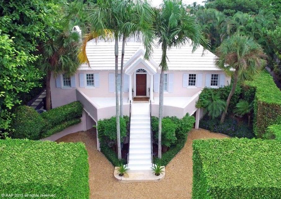 An ESTATE SECTION home is offered at a North End Price! Convenient to public beach & town; nestled among the grand estates, offering space and privacy. In move-in condition, new systems, sizeable garden & low upkeep costs. Formal living features a fireplace and dual French doors leading onto a large canopied loggia making the house perfect for entertaining in any weather. Impact doors, windows and/or shutters offer complete storm protection. Eat-in kitchen features SubZero refrigeration, 2 prep sinks w/disposals, 2 BOSCH dishwashers, 6-burner Thermador gas range,3 SubZero wine coolers and butler's pantry leading to the formal dining room with fireplace and tray ceiling. Covered parking for up to 2 cars, driveway parking for up to 4 cars and secluded parking for vendors. DISCLAIMER: The written and verbal information provided including but not limited to prices, measurements, square footages, lot sizes, calculations and statistics have been obtained and conveyed from third parties such as the applicable Multiple Listing Service, public records as well as other sources. All information including that produced by the Sellers or Listing Company are subject to errors, omissions or changes without notice and should be independently verified by any prospect for the purchase of a Property.  The Sellers and Listing Company expressly disclaim any warranty or representation regarding all information.  Prospective purchasers' use of this or any written and verbal information is acknowledgement of this disclaimer and that Prospects shall perform their own due diligence.  Prospective purchasers shall not rely on any written or verbal information provided when entering a contract for sale and purchase.  Some affiliations may not be applicable to certain geographic areas. If your property is currently listed, please do not consider this a solicitation. In the event a Buyer defaults, no commission will be paid to either Broker on the Deposits retained by the Seller.  "No Commissions Paid until Title Passes."  Copyright 2018 Listing Company. All Rights Reserved.