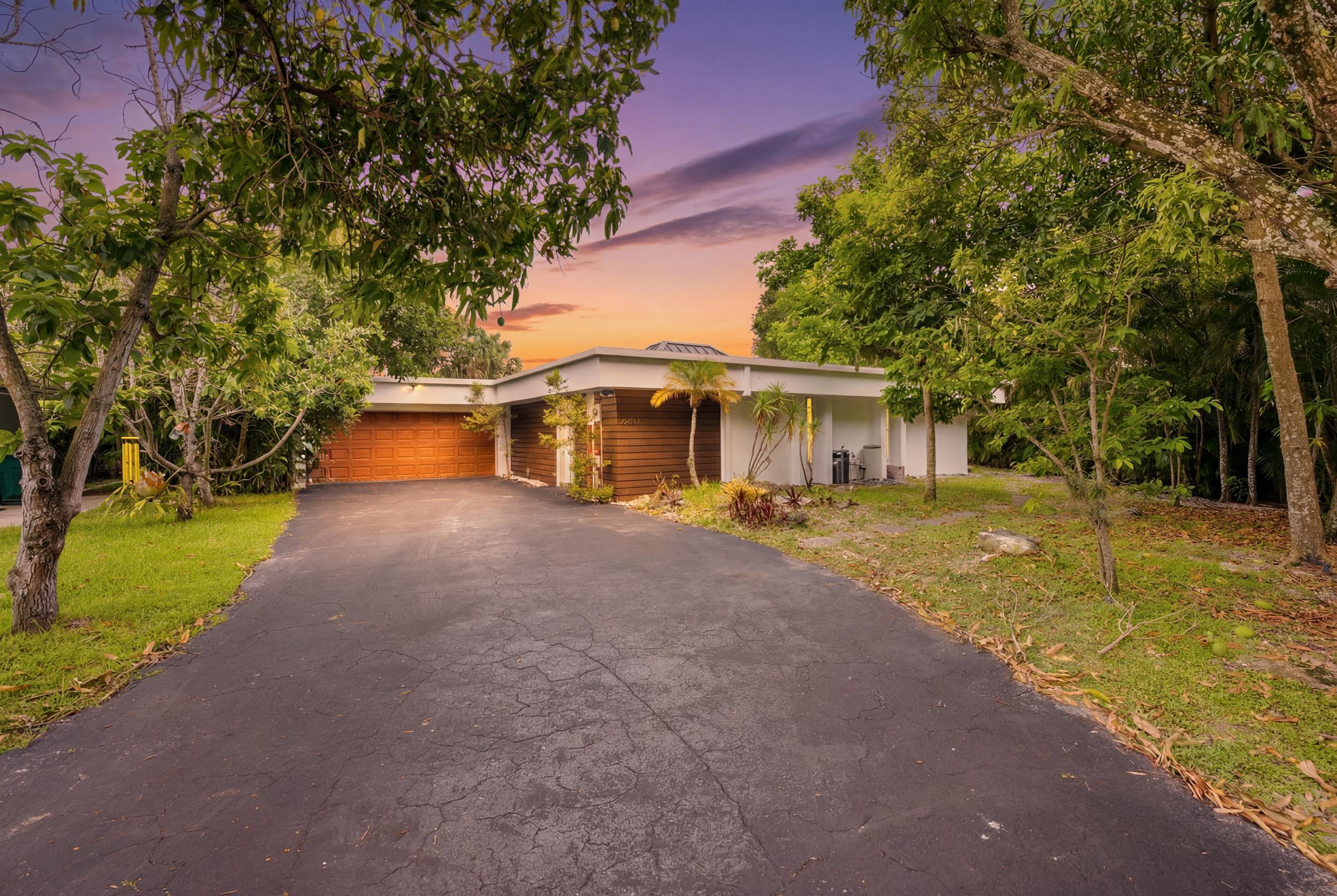 Fully renovated and move-in ready! This beautifully updated home features impact windows and doors, offering both peace of mind and energy efficiency. Enjoy a private backyard oasis with a low-maintenance turf deck and a covered shaded area—perfect for grilling, entertaining, or relaxing year-round. Located in the highly sought-after Woodlands community, this home combines modern upgrades with an unbeatable location. HOA fees include lawn maintenance and neighborhood security patrol, providing added convenience and peace of mind. Don't miss the opportunity to own this turnkey home in one of Tamarac's most desirable communities! 2023 roof, 2026 water heater, 2019 AC!!!
