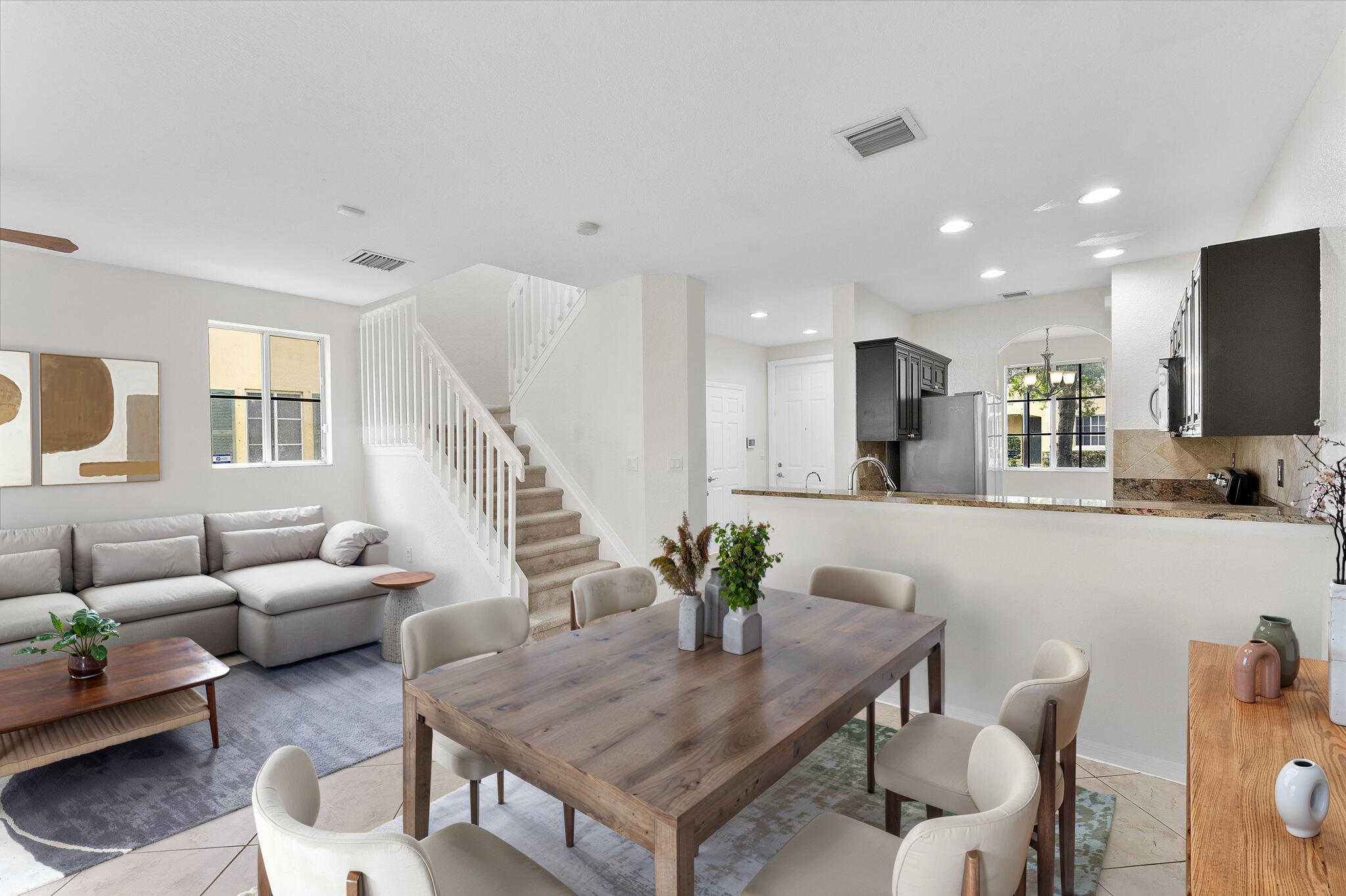 Welcome to this rare end-unit gem in the highly sought-after San Remo community, offering enhanced privacy with only one neighbor and an abundance of natural light throughout its spacious 3-bedroom, 2.5-bathroom layout. This meticulously maintained townhome features significant mechanical upgrades for total peace of mind, including a recently installed A/C unit, a brand-new indoor water purifying system, and a whole-house outdoor water softener. The interior boasts an updated kitchen with elegant granite countertops, oversized bedrooms with ample storage, and the ultimate convenience of an upstairs laundry room. The primary owner's suite serves as a true retreat, complete with massive walk-in closets and a spa-like bathroom featuring both a soaking tub and a separate standing shower. Residents also enjoy access to premium community amenities, including a sparkling pool, clubhouse, and playground, making this move-in-ready home the perfect blend of comfort and lifestyle.