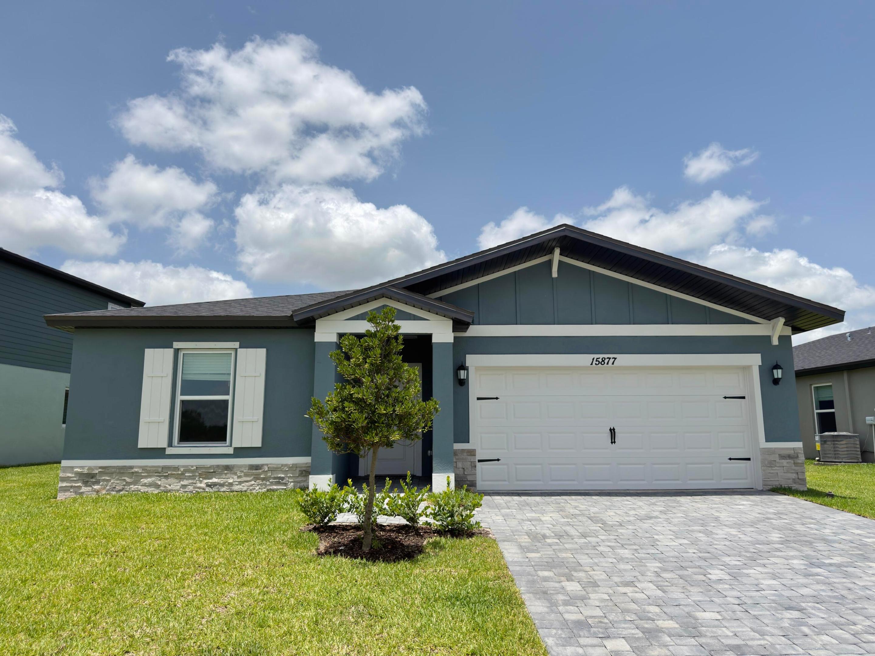Brand new, energy-efficient home available NOW! Prepare dinner while catching up on the day's events from this home's open kitchen which overlooks a spacious great room and dining area. Retreat to your primary suite that is conveniently situated in the back of the home for plenty of privacy. Move-in ready homes are now available at Terra Lago. Offering new homes in Indiantown, future residents will have access to resort-style amenities including a clubhouse, pool, walking trails, and more. With convenient access to both Martin and Palm Beach County, Terra Lago will be the perfect place to call home.  Each of our homes is built with innovative, energy-efficient features designed to help you enjoy more savings, better health, real comfort and peace