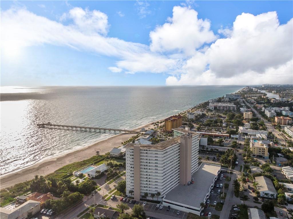 Spectacular direct ocean views!!! Completely renovated 1 bedroom 1.5 bath condo with hurricane impact sliders and windows and amazing views from every room. Beautiful kitchen with real wood cabinets, granite counters, stainless steel appliances. Large balcony with access from both living room and bedroom. Bedroom is ensuite with large walk in-shower with frameless glass door, vessel sink. Unit located close to the elevator and community laundry room. Beautifully renovated oceanfront clubhouse with heated pool, putting green, BBQ area, beach access. Fitness room in main building and 24/7 front desk security. Covered parking space. Great location, walking distance to the pier, beach volley ball courts, restaurants, bars and shops. Don't miss this opportunity!