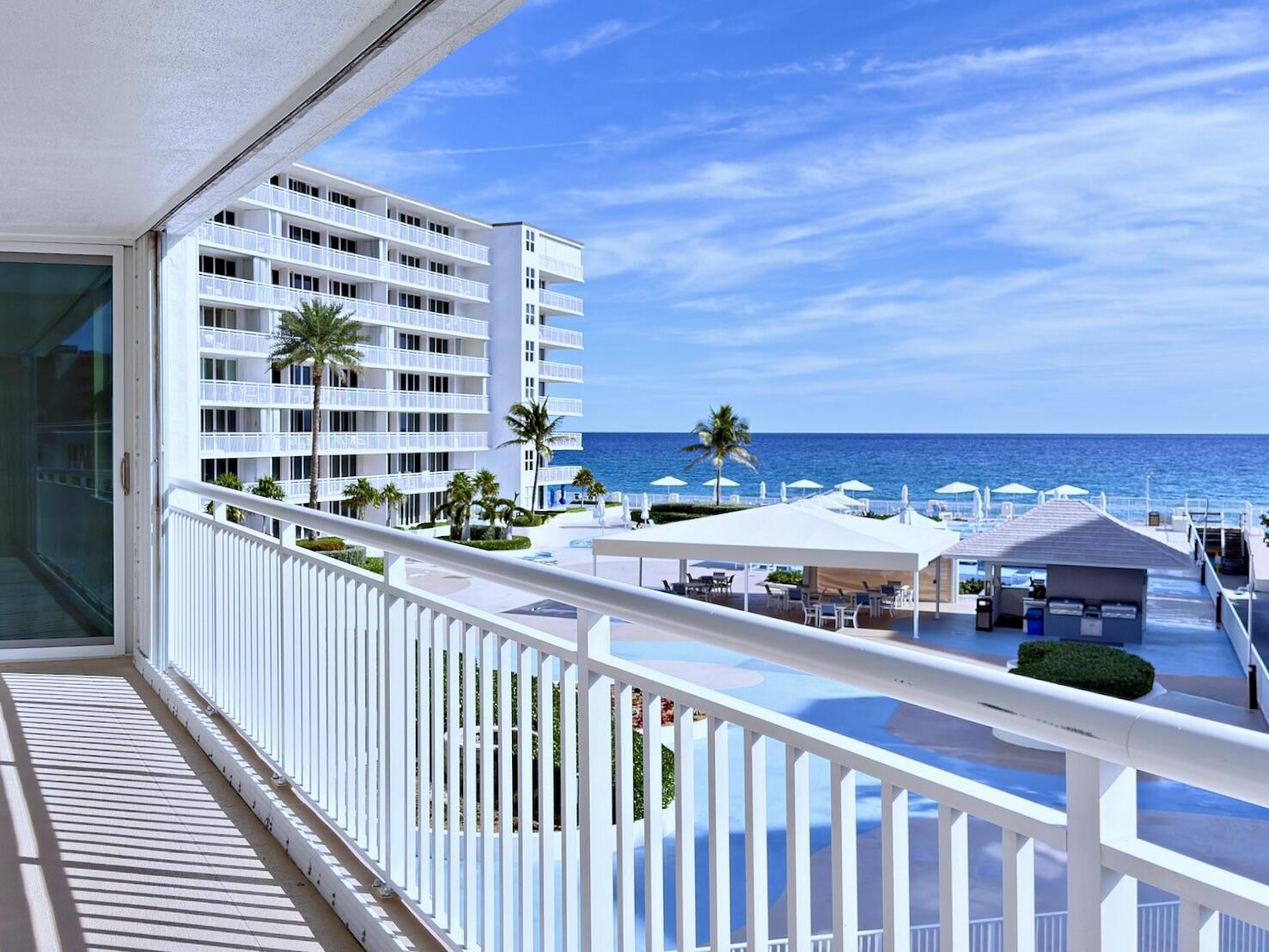 Very spacious 2 Bed / 2 Bath residence offering 1,650 sq. ft. of living space, plus an oversized wraparound balcony with beautiful South-East Ocean and Pool Views, and breathtaking Sunsets to the west. The expansive primary suite features direct balcony access, two oversized walk-in closets, and an updated ensuite bath with dual sinks, a soaking tub, and a separate shower. A washer and dryer are conveniently located within the unit.  The bright kitchen offers a lovely eat-in area with window and ocean views, along with direct balcony access, perfect for morning coffee with sunrise views over the Atlantic or unwinding in the evening while enjoying spectacular sunsets. The generously sized second bedroom offers excellent space and flexibility.   Tile flooring runs throughout, and the residence has been upgraded with full impact windows for added comfort.  Live the resort lifestyle with unbeatable amenities at the Barclay. Come and experience coastal living at its finest! The Barclay offers an array of amenities such as: direct beach access, gym, heated pool, tennis/pickaball courts, BBQ area, outdoor kitchen, saunas, business center, party room, game room, lounge, drive-through car wash, bike storage, 24/7 concierge, cable, internet and more...