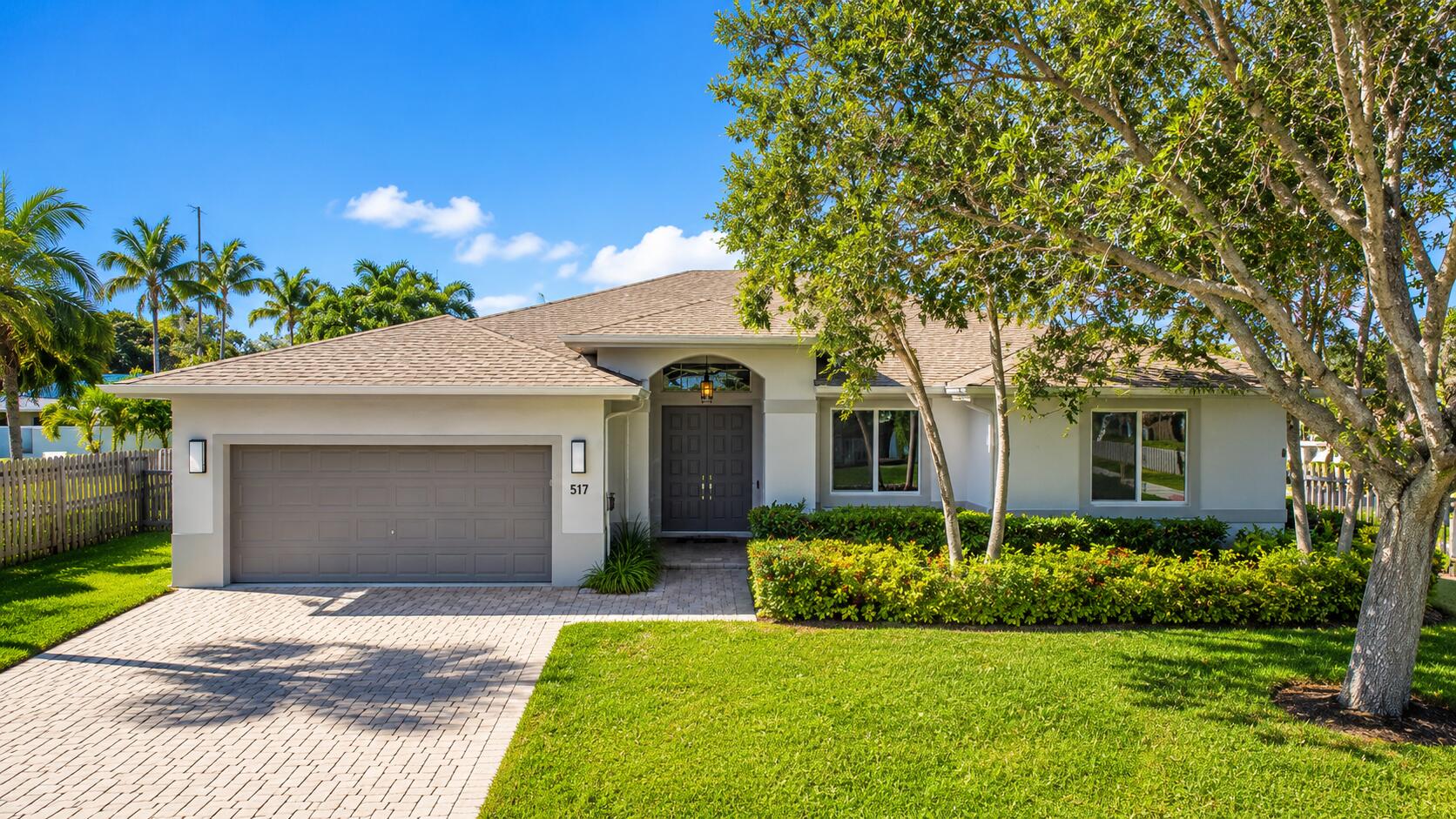 Welcome to this spacious 4-bedroom, 2.5-bath pool home with a NEW ROOF and all-impact windows and sliding glass doors, situated on a large corner lot in desirable East Deerfield Beach. Built in 2000, the home offers 2,480 square feet of living space, a two-car garage, soaring ceilings and a bright, open floor plan. Sliding glass doors open to a private fenced backyard with a 17-by-28-foot pool, large covered patio and gated side yard with room to securely park an RV or boat. Additional highlights include a split-bedroom layout, formal living and dining areas, an office or den, walk-in closets, wood and tile flooring, a new washer and dryer, new water heater and no HOA. Conveniently located near the beach, shopping, dining and everything Deerfield Beach has to offer.