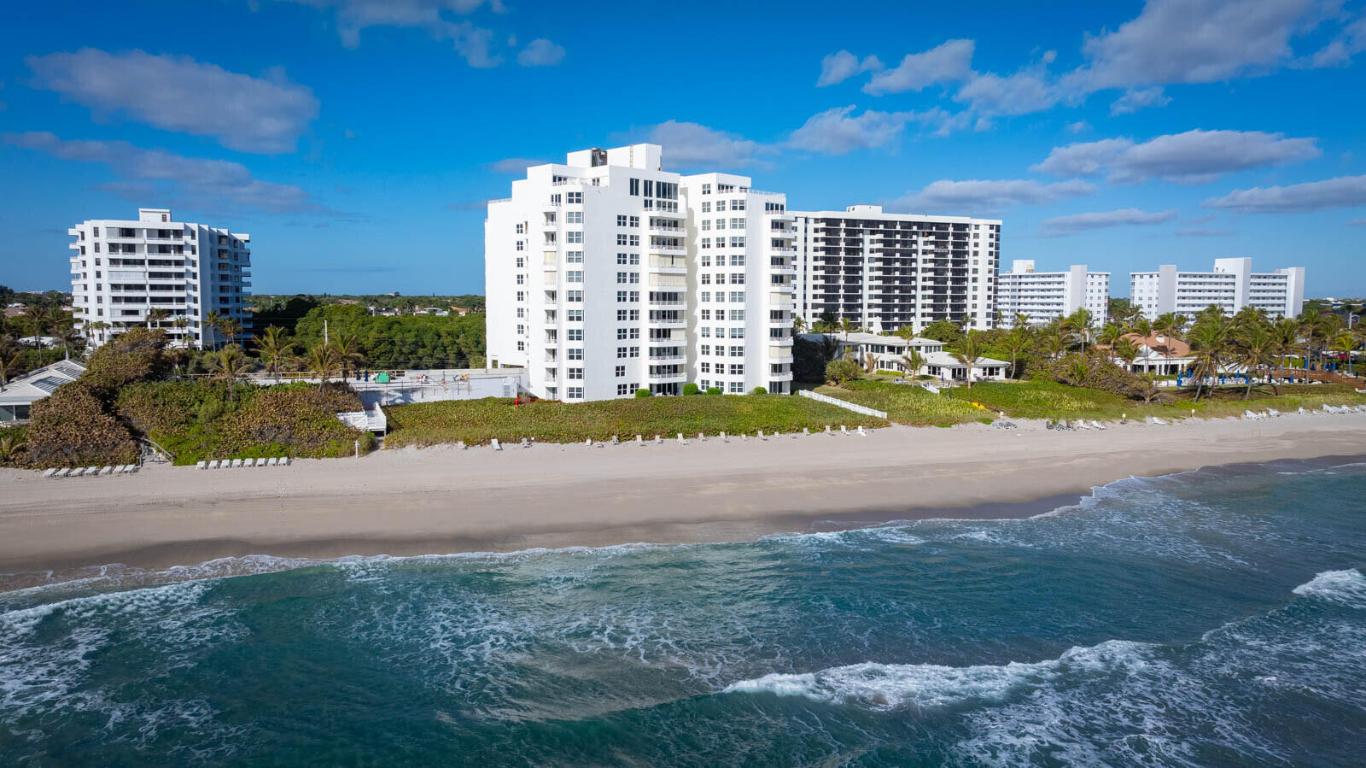 SELLER MOTIVATED - Wake up to endless ocean views in this extraordinary, fully reimagined residence at the prestigious Clarendon in Highland Beach. Showcasing sweeping 180-degree Atlantic vistas, this truly one-of-a-kind condo has undergone a no-expense-spared renovation with over $600,000 invested in impeccable design, craftsmanship, and finishes--every detail is brand new, delivering a flawless turnkey opportunity. The stunning chef's kitchen is the centerpiece of the home, featuring a dramatic waterfall stone island and top-of-the-line Miele appliances, seamlessly blending form and function for effortless entertaining or everyday living. Floor-to-ceiling impact windows and doors flood the space with natural light while framing the ocean as living artwork throughout the home. Enjoy sunrise coffees or sunset cocktails from one of two private balconies, where the sound of the waves creates a serene coastal escape. This residence is widely considered one of the finest in the building, offering an unmatched combination of views, upgrades, and privacy. The Clarendon is celebrated for its striking architecture, oceanfront presence, and exceptional amenities, perfectly complementing the elevated lifestyle this home provides. Located in one of Florida's most coveted beachfront enclaves, this is a rare opportunity to rent for season in a fully modernized, designer oceanfront retreat. Two garage parking spaces included. Private showings available experience luxury coastal living at its finest.