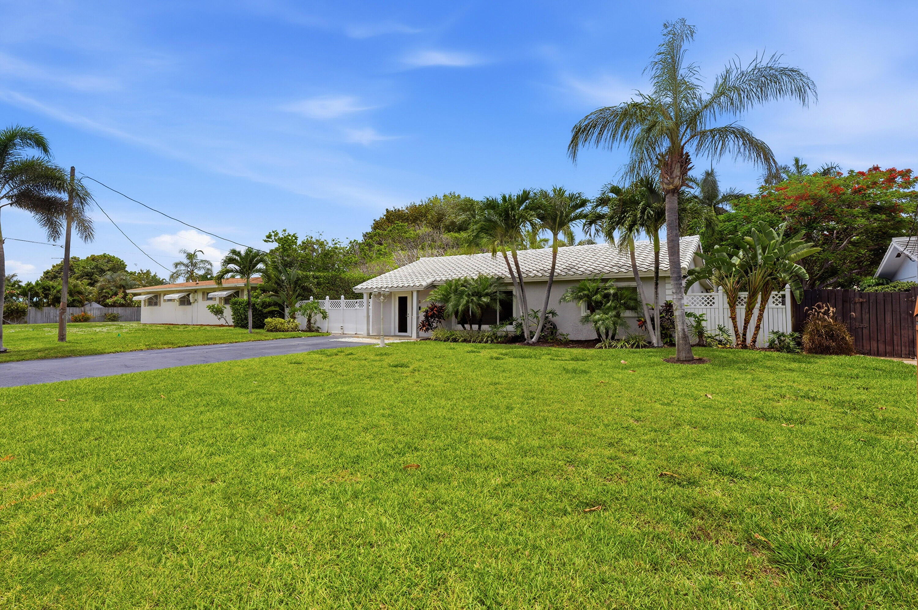 This bright and welcoming home sits just east of Federal Hwy. The large fenced backyard features a pool, a shed, and a covered patio, making it perfect for entertaining or relaxing in your own private space. Inside, you'll find two bedrooms and two bathrooms, plus a bonus room that can serve as a third bedroom, office, or game room, with direct access to the patio. The kitchen has all new appliances, and the home is fully protected against hurricanes. Water, pool service, and landscaping are included in the rent.