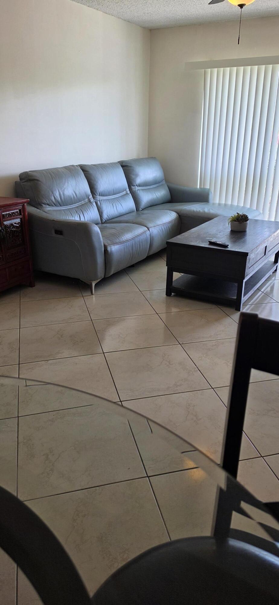 Welcome to this charming two-bedroom, two-bathroom condominium nestled in Golden Lakes Village in West Palm Beach, Florida. This two-story residence spans 888 square feet of finished living space, offering an efficient and comfortable layout. As a waterfront property, this condo provides the appeal of water proximity and the lifestyle it affords. Located within the established Golden Lakes Village community, this unit presents an accessible entry point to waterfront living in West Palm Beach.