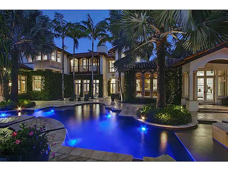 Venetian inspired Italian estate boasts 6 bedrooms, 6 baths, 2 half baths, 3 fireplaces & 3.5 car garage + 1 car showcase.  A ground floor master suite, architectural ceilings, gourmet kitchen & billiard lounge only begin to exemplify unique design elemen ts.  The resort lakefront pool with sunken bar, spa and outdoor kitchen are surrounded by mature specimen vegetation. Positioned in the exclusive gated Windmill Ranch Estates this architectural masterpiece welcomes entertaining & gracious living..