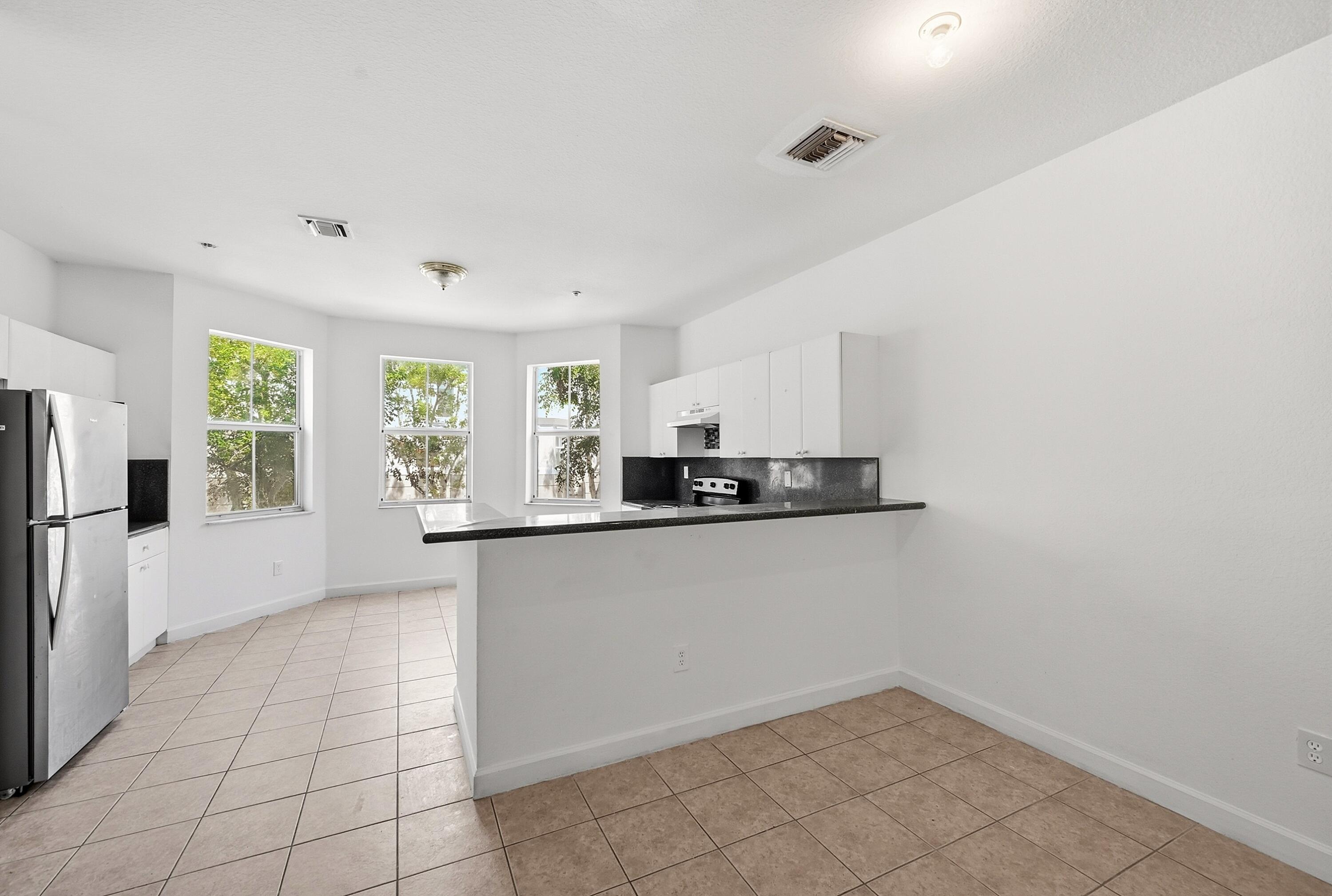 SHOMA TOWNHOMES AT ROYAL PALM BEACH CONDO - Residential