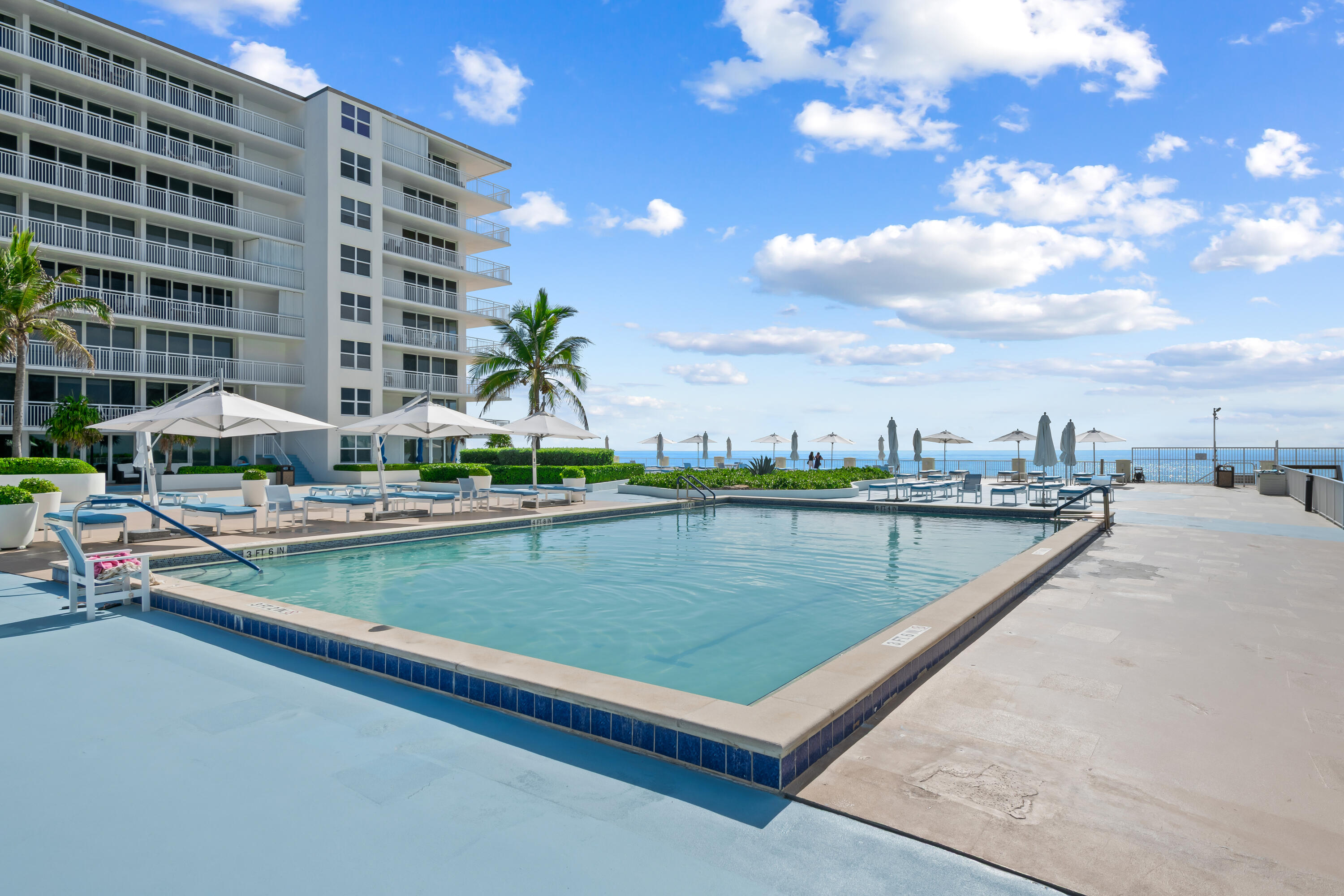 Enjoy beach living at its finest! This 1-bedroom plus convertible 2nd bedroom, 2-bath condo is just steps from the beach. Features include impact sliders, an in-unit washer/dryer, and laminate and tile flooring throughout. Every room has access to the spacious balcony overlooking the Intracoastal, tropical gardens, and fountains. The primary suite offers a walk-in closet. Sold furnished and includes a storage unit. The Barclay features direct beach access and resort-style amenities, including a heated pool, fitness center, tennis courts with pickleball lines, BBQ area, outdoor kitchen, saunas, business center, party room, game room, lounge, bike storage, 24/7 concierge, plus water, cable, and internet are included.