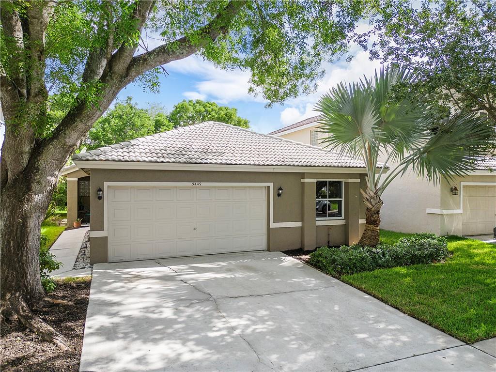 Welcome to the beautiful, gated community of Lake Windermere in Indigo Lakes! This spacious 4/2 home that boasts a split floor plan design offers both privacy and functionality. The primary suite, located on one side of the house, features a spacious bedroom with ample closet space and a private en-suite bathroom. The remaining three bedrooms, situated on the other side. This layout offers the perfect balance between shared spaces and personal retreats. This wonderful home is situated just minutes away from The Promenade, Coconut Casino, along with both Primary and Secondary schools, making this location the perfect blend of convenience and entertainment. Residents of the Indigo Lakes Community have access to amenities, including a swimming pool & gym, with a low HOA of $185 a month.