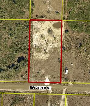 1.25 Acre lot, cleared and ready for your new home.  Culvert in place, property is fully fenced and there is a pond.