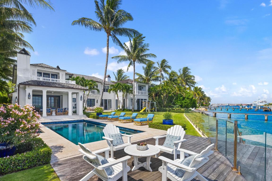 Welcome to 1610 N Ocean Blvd, a rare opportunity to own a spectacular 6-bedroom, 7.2-bathroom waterfront residence, masterfully built in 2018. With breathtaking views from all principal rooms, this elegant estate offers the perfect blend of British West indies elegance and contemporary refinement.

A long private, gated driveway leads to a grand, beautifully landscaped courtyard entrance - providing the feeling of entering a lush tropical compound. The iconic entryway leads into an expansive formal living room with a stately fireplace, with Bahamian blue water colors conveniently positioned as the perfect backdrop. The gourmet chef's kitchen is a culinary dream, featuring a large center island and seamlessly flowing into the spacious family room, ideal for relaxed entertaining. Thoughtfully designed for both comfort and convenience, this trophy estate includes a richly appointed library, a private elevator, a fully equipped staff kitchen, and two separate garages fitting up to 4 vehicles. Above each two car garage, sits ideally separated guest suites, one connected to the home and one unattached - allowing residents to generously host their guests and family with the added perk of privacy and space.

The owner's suite is a private retreat with sweeping Intracoastal views, an elegant sitting room, morning bar, dual spa-inspired baths, generous walk-in closets, and a serene balcony complete with a fireplace. A luxurious VIP suite on the first floor offers a walk-in closet, opulent bath, and private patio access, perfect for guests and family. 

Resort-style outdoor enjoyment is defined by elevated island landscaping, a sparkling pool and spa, a breath-taking covered waterfront loggia with fireplace and TV, and a private dock with boat lift and seating area, all overlooking the tranquil water views. 

This generational, legacy residence pairs the privacy of the North End and the beauty of island life with convenient access to both the idyllic town of Palm Beach and the bustling commercial hub of West Palm Beach. 

DISCLAIMER: Information published or otherwise provided by the listing company and its representatives including but not limited to prices, measurements, square footages, lot sizes, calculations, statistics, and videos are deemed reliable but are not guaranteed and are subject to errors, omissions or changes without notice. All such information should be independently verified by any prospective purchaser or seller. Parties should perform their own due diligence to verify such information prior to a sale or listing. Listing company expressly disclaims any warranty or representation regarding such information. Prices published are either list price, sold price, and/or last asking price. The listing company participates in the Multiple Listing Service and IDX. The properties published as listed and sold are not necessarily exclusive to listing company and may be listed or have sold with other members of the Multiple Listing Service. Transactions where listing company represented both buyers and sellers are calculated as two sales. "No payments made until title passes" Some affiliations may not be applicable to certain geographic areas. If your property is currently listed with another broker, please disregard any solicitation for services. Information published or otherwise provided by seller, listing company or its representatives is deemed reliable but are not guaranteed and subject to errors, omissions, or changes without notice. Copyright 2026 by the listing company. All Rights Reserved.