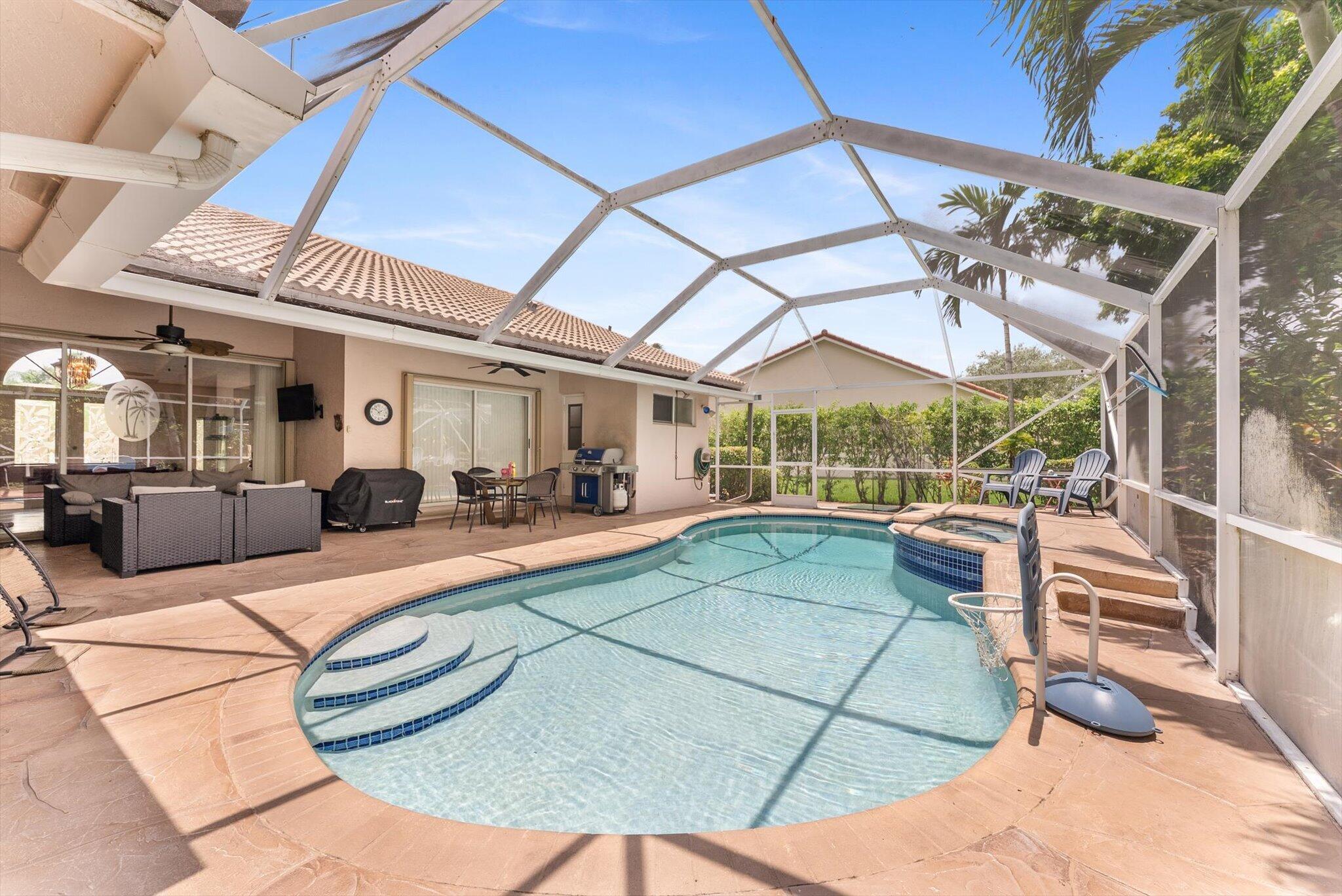 Beautifully maintained 4-bedroom, 2-bath pool home on a quiet, oversized cul-de-sac in the desirable Brookside community. This home features an updated kitchen w/ wood cabinetry, granite countertops, stainless steel appliances, and an open layout perfect for entertaining. The updated bathrooms, custom electric fireplace, plantation shutters, upgraded LED lighting add warmth and style throughout. Enjoy your private backyard oasis with a covered screened patio, heated pool and spa, mature landscaping, and a fully fenced yard with room for children and pets. Front of house has impact windows, back has accordion shutters. Functional floor plan with an open kitchen overlooking the breakfast area and family room, plus formal living and dining rooms, all flowing to the private backyard retreat. Conveniently located near top-rated schools, parks, shopping, dining, and major highways.