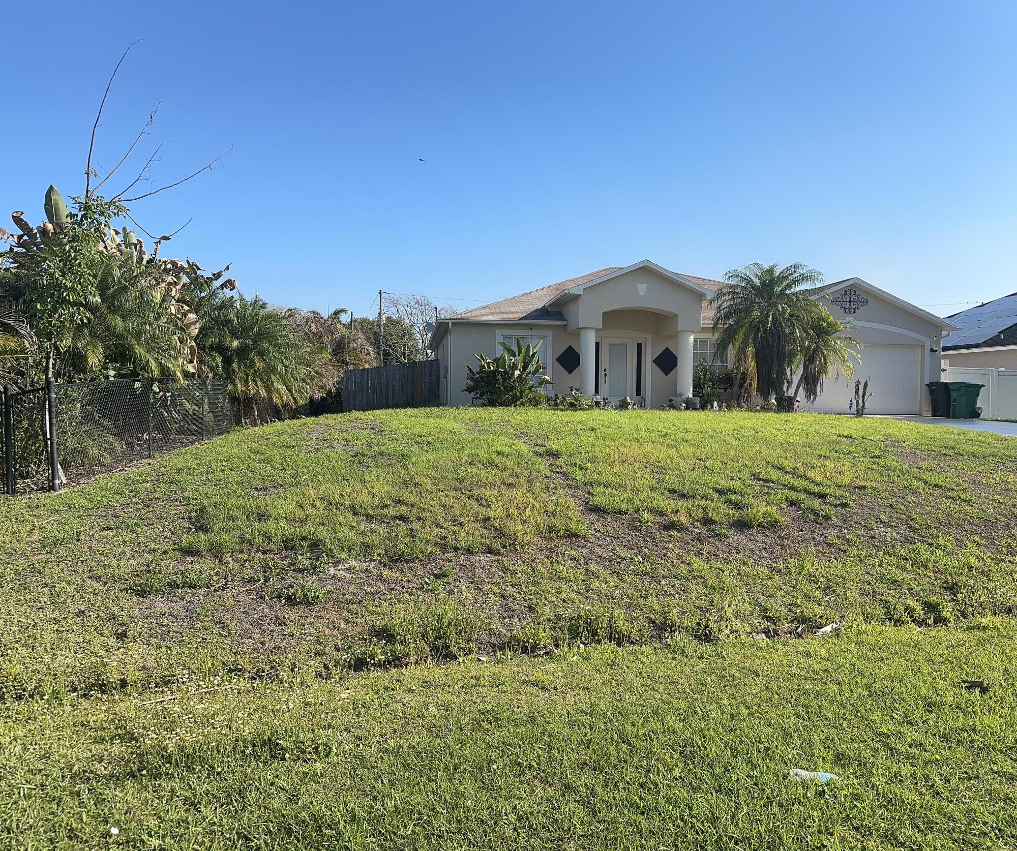 Beautiful Home and nice neighborhood. Room for a pool. Fenced and Florida room with tiled floor. Kitchen has stainless steel appliances and is tiled thru the family room. Do not miss this opportunity.