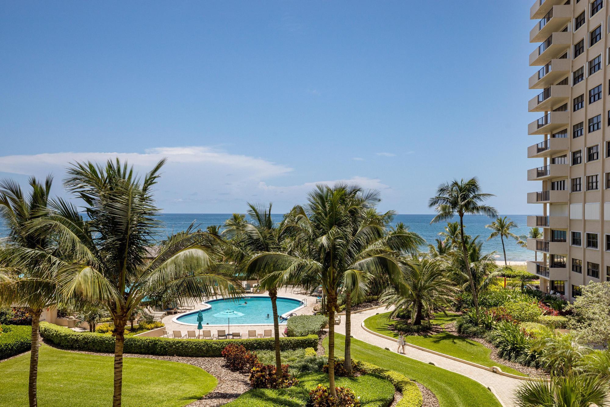 Try to BEAT IT!! Direct ocean views and resort-style beachfront living in one of the most desirable oceanfront locations near Lauderdale-by-the-Sea! Spacious 2-bedroom, 2-bath residence with over 1,760 sq. ft. featuring a semi-private elevator, impact windows and doors with , neutral tile flooring, and an eat-in kitchen with stainless steel appliances and granite countertops. The generous primary suite offers a large walk-in closet and dressing area. Two assigned covered parking spaces are included and conveyed with the unit, with one parking space conveniently located near the elevator. Lease immediately after purchase.Pet-friendly building allowing up to 2 dogs. Perfectly located along Fort Lauderdale's beautiful oceanfront, just minutes from the charm of Pompano Pier nature at its best! Perfectly located along Fort Lauderdale's beautiful oceanfront, just minutes from the charm of Lauderdale-by-the-Sea, the pier, beachfront dining, cafes, shops, grocery store, restaurants, and everyday conveniences. Enjoy amenity-rich living on approximately 14 acres of deep beachfront with 3 heated pools, 3 open-air kitchens with gas grills, beachfront charcoal grills and picnic areas, 8 oceanside tennis and pickleball courts, 2 herb gardens, 2 pet parks, dry saunas, gym, billiards, card room, storage, EV charging stations, car wash areas, assigned and guest parking in a gated garage, and 24-hour front desk/security. Resort living at its finest! ez to show