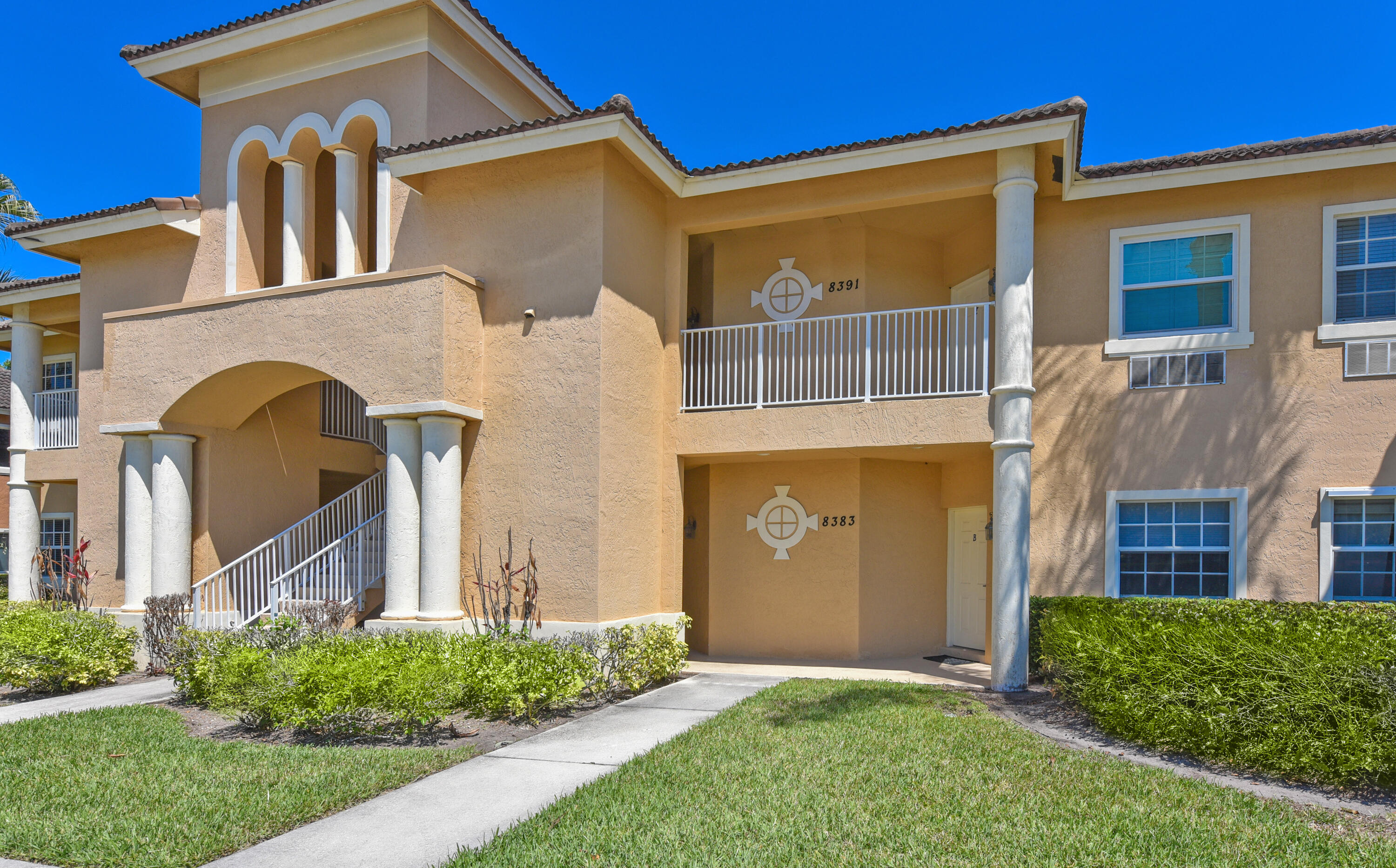 Ground floor 2BR/2.5BA furnished condo in Castle Pines at PGA Village, located close to the pool and mailboxes. Flexible layout with two separate living areas, each with a private entrance—ideal for personal use or rental income. Side A offers a full kitchen with new quartzite countertops and newer appliances, living/dining area, large bedroom with walk-in closet, ensuite bath, and a screened patio overlooking the preserve. Side B features a private guest suite with full bath and kitchenette. Recent updates: newer appliances (2024), washer/dryer (2024), HVAC for both sides (<5 yrs), hot water heater (2022), lanai rescreen (2025), LED lighting (2025), refinished cabinets (2025), wine fridge (2025), new tile bedroom floors, interior paint (2024), new furniture and mattresses (2024).