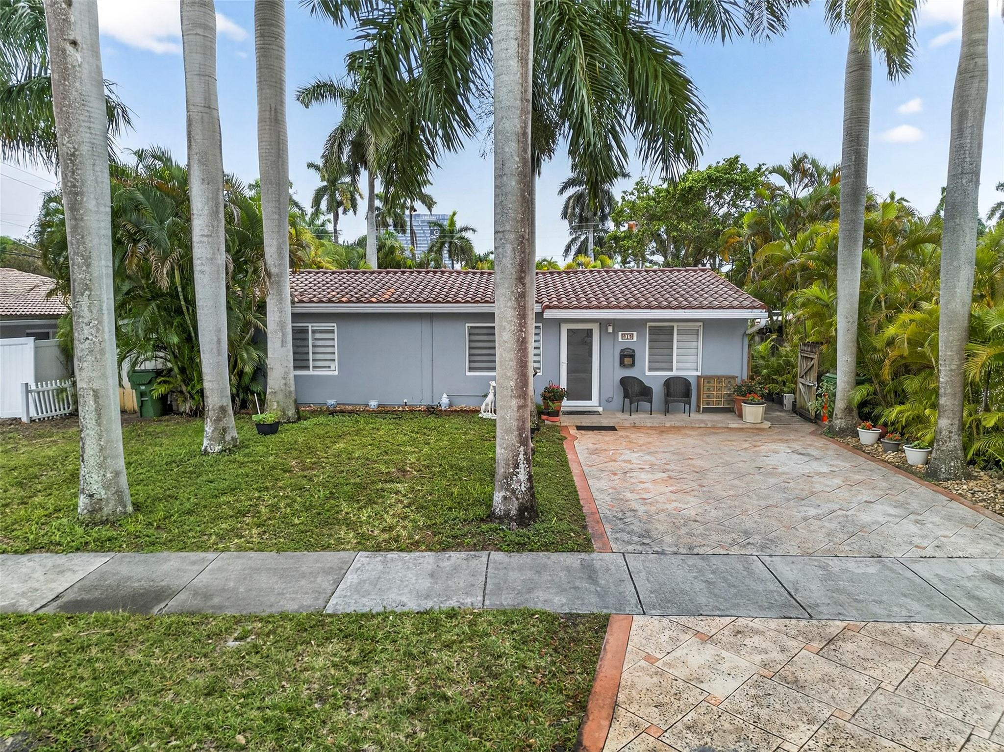 Revel in the charm of this move-in-ready home located in a prime location! Features 3 bedrooms/4 bathrooms includes a newer A/C, updated master bathroom, oversized master bedroom, and a split-bedroom layout. Updated kitchen with quartz countertops, backsplash, and newer appliances. Bonus secondary kitchen offers extra flexibility—ideal for extended family or entertaining. Master Bedroom can be converted into 2 bedrooms.  Enjoy outdoor space with a garden area plus added storage with a storage shed. Conveniently located within walking distance to houses of worship and Aventura Mall, and just 15 minutes to Ft. Lauderdale International Airport. A must-see!