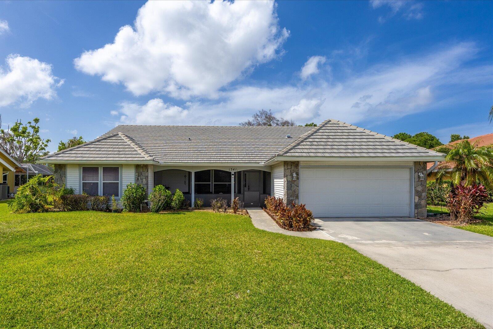 Welcome home. Come see this beautiful home in Heatherwood community. One of the most prestigious neighborhood in Port Saint Lucie area. Open floor with a split bedroom plan, vaulted ceiling , 3 bedrooms, 2 baths with a 2-car garage in a gated community. Roof is about 5 years old and A/C is about 9 years old. A large kitchen with a breakfast area, large patio to relax after a long day from work. An opportunity your buyer cannot afford to miss.