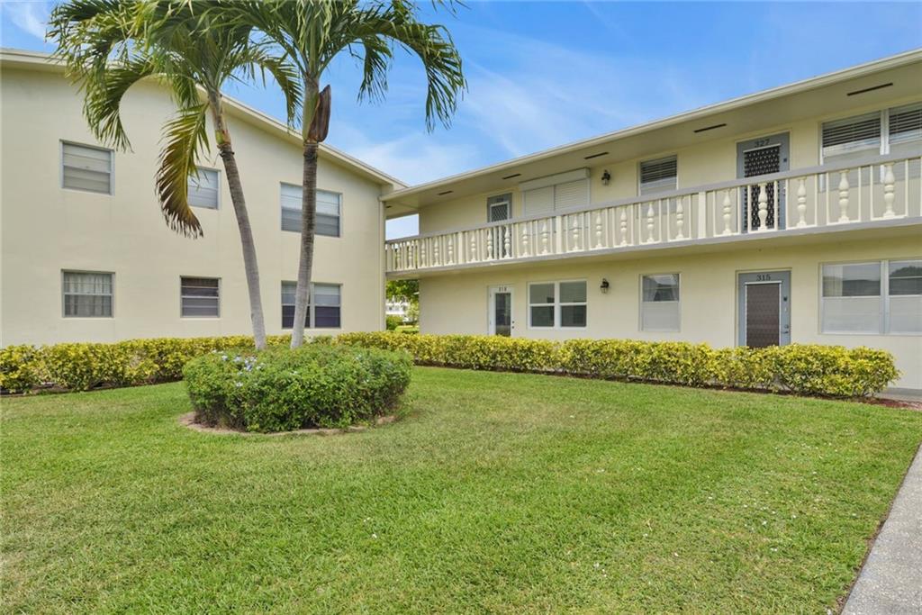 **BACK ON THE MARKET**  BUYER FELL THROUGH.  COME SEE THIS UNIQUE FIRST FLOOR CORNER UNIT WITH TOP OF THE LINE IMPROVEMENTS.  IMPACT WINDOWS (10) AND DOORS (FRONT DOOR AND SLIDER IN SECOND BEDROOM)  THROUGHOUT AS WELL AS IN THE FLORIDA ROOM.  HUNTER DOUGLAS WINDOW AND DOOR TREATMENTS.  FRESHLY PAINTED AND SPOTLESS.  UPGRADED ELECTRIC PANEL AND ALL NEW SWITCHES AND OUTLETS.  4 MINKA AIR FANS WITH LIGHTS.  65” SONY TV IN THE LIVING ROOM AND ONE 30” TV IN THE MAIN BEDROOM. NEWER NEUTRAL TILE THROUGHOUT.  OFFERED FURNISHED "TURN KEY" WITH BRAND NEW MARBLE KITCHEN TABLE, VIKING MICROWAVE AND WOLF TOASTER OVEN.  BRAND NEW FRIGIDARE SS REFRIGERATOR.  SECOND BEROOM HAS A DESK, 2021 APPLE DESK TOP COMPUTER W/27" MONITOR, HP ALL IN ONE PRINTER, FELLOWES SHREDDER.  KING BED IN THE MAIN BEDROOM.