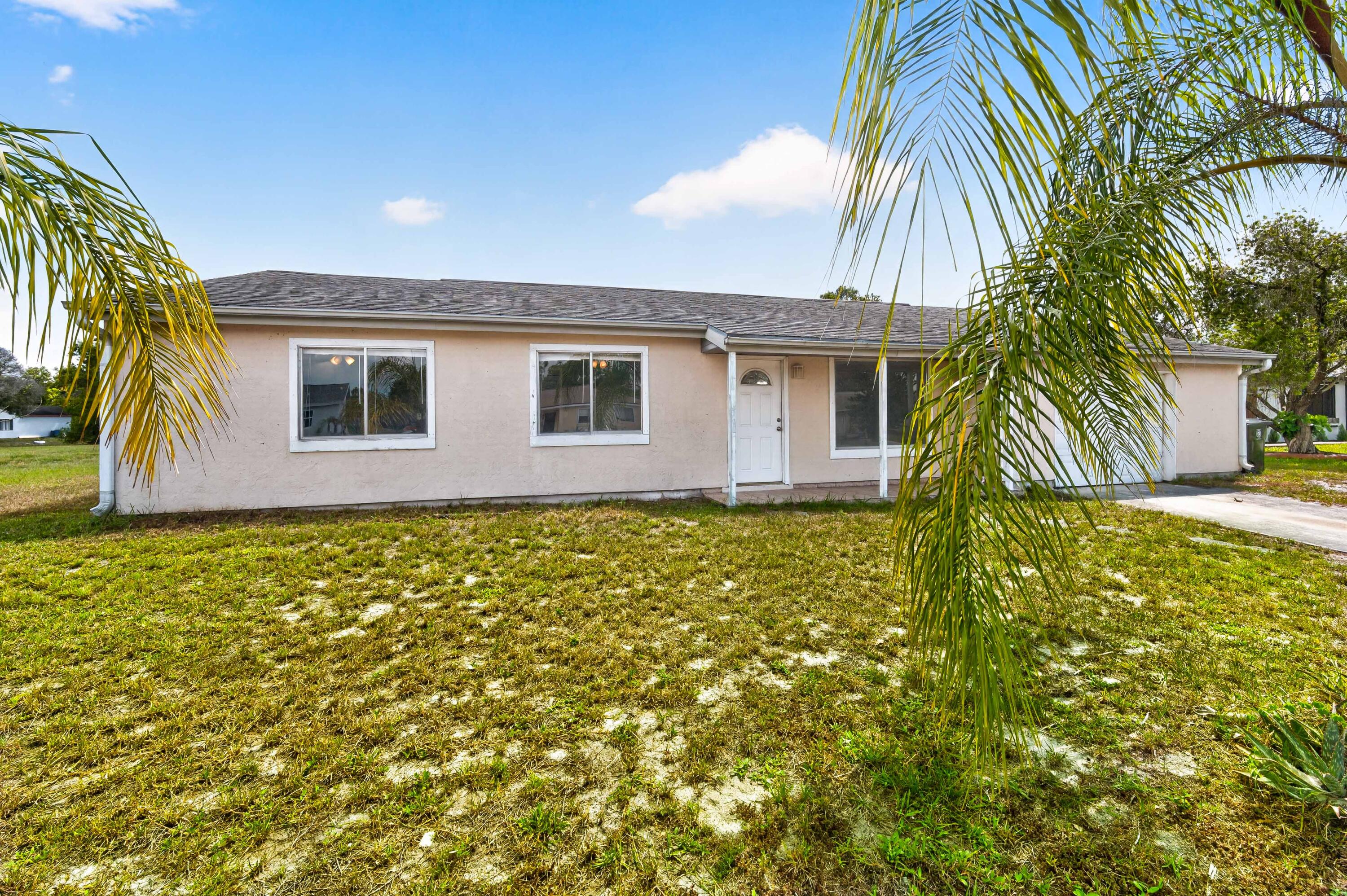 A brand-new roof is scheduled to be installed, providing added confidence and long-term value for the next owner. Whether you're a first-time homebuyer, seasonal resident, or investor, you'll appreciate the potential this home has to offer. Conveniently located near shopping, dining, schools, parks, and major commuter routes, this home combines affordability with a fantastic Port St. Lucie location.       Don't miss your chance to own a home with a new roof on the way and endless possibilities to make it your own! Schedule your private show