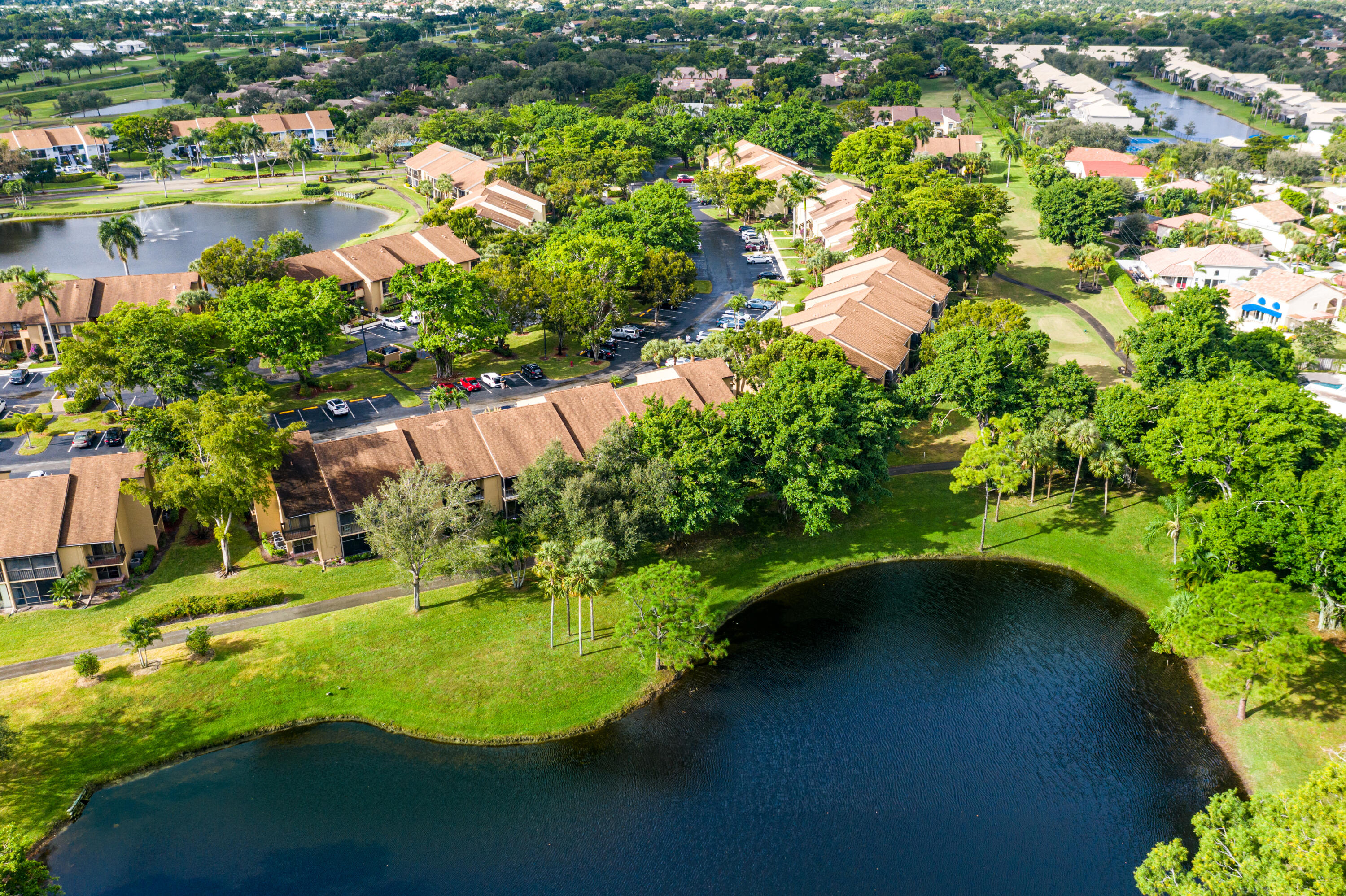 Lakefront Penthouse w/ Vaulted Ceilings & Laminate Flooring*Plenty of Closets for Storage*Screened Patio adds extra living space*Non-Equity 55+ Country Club in the heart of Delray & Boca*Minutes to the beach*Use Facilities upon Ownership*NO ANNUAL DUES & NO INITIATION FEE*Challenging Par-60, 18-Hole Golf Course is on 160 Acres*Work on your game while enjoying a variety of Wildlife and 15 peaceful Lakes*Our Golf Pro is determined to improve your game with Clinics & Private Lessons*Community Bee Hives makes our own homemade Honey*Our 10,000 SF Clubhouse has been Remodeled*New Guard House Coming*We have 2 Pools, Tennis, Tournaments, Pickleball, Parties & Activities*Pet Friendly*A sensational country club at a sensible price! I