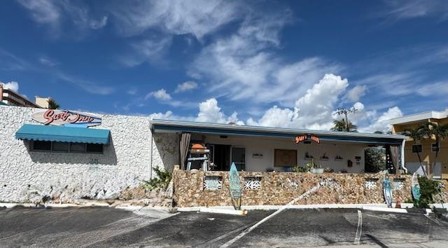 **Prime Beachfront  Investment Opportunity-----SURF INN   308 Monroe Street,  Hollywood, FL 33019  Owner Financing!!! Owner Financing !!  A rare beachfront asset on Hollywood Beach exceptional investment and upside potential,  conveniently situated just  steps from the beach and Atlantic Ocean.PROPERTY TYPE: HOSPITALITY/MOTEL/MULTI-FAMILY INCOME.  BUILDING SIZE.  APROX 4,658 +-LOTS SIZE 0.18 ACRES (7690 SQ FT), BUILT 1954,  10 oversized units with kitchens and generous layouts.   Outstanding location  situated on the quieter end of the beach with pedestrian -Friendly Broadwalk, access nearby bike rentals, restaurant's , and entertainment.  spacious front patio with Oceanview's, perfect for guests, events or relaxing, Private parking, solar panels, new electric box's low utilities